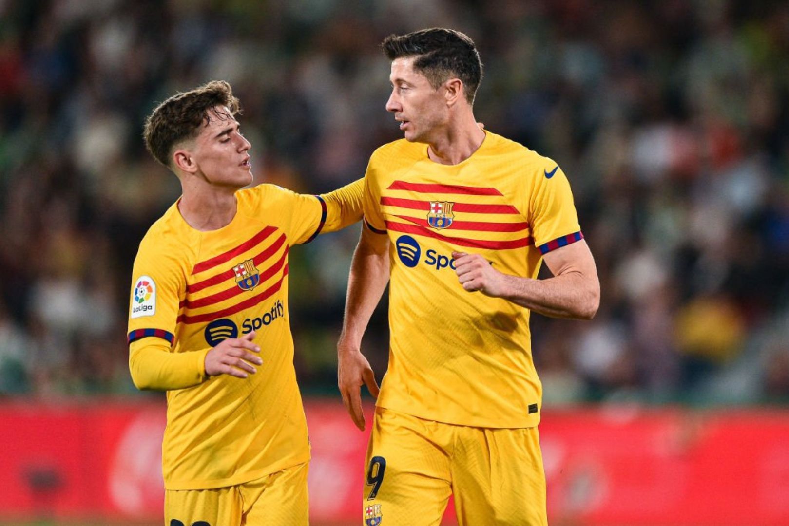 Barcelona players Gavi and Lewandowski during a match