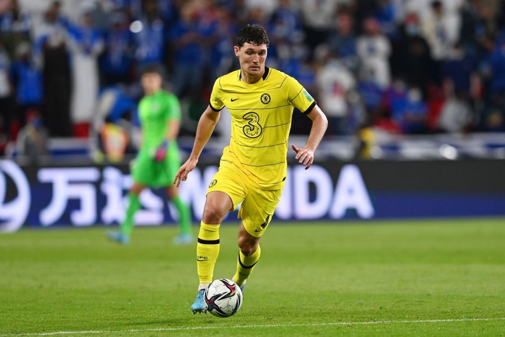 Andreas Christensen of Chelsea runs with the ball during the FIFA Club World Cup UAE 2021 Semi Final match between Al Hilal and Chelsea FC at Mohammed Bin Zayed Stadium on February 09, 2022 in Abu Dhabi, United Arab Emirates.