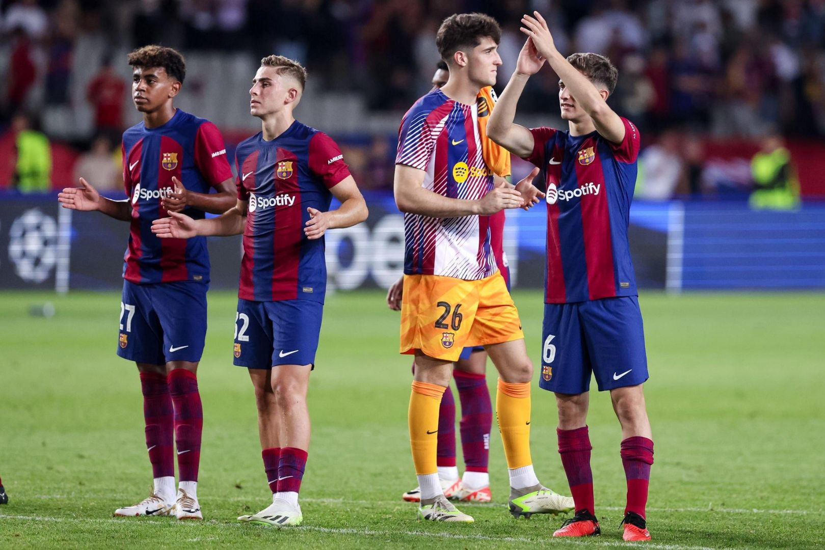 Barcelona players applauding fans