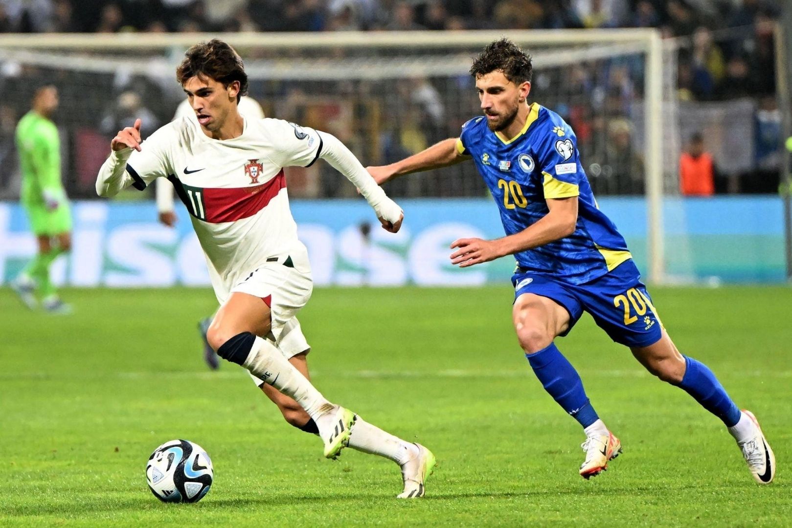 Portugal's and Barcelona forward #11 Joao Felix (L) controls the ball in front of Bosnia-Herzegovina's midfielder #20 Miroslav Stevanovic (R) during the UEFA Euro 2024 Group J qualification football match Bosnia-Herzegovina v Portugal at the 'Bilino Polje' stadium in Zenica, Bosnia-Herzegovina on October 16, 2023.