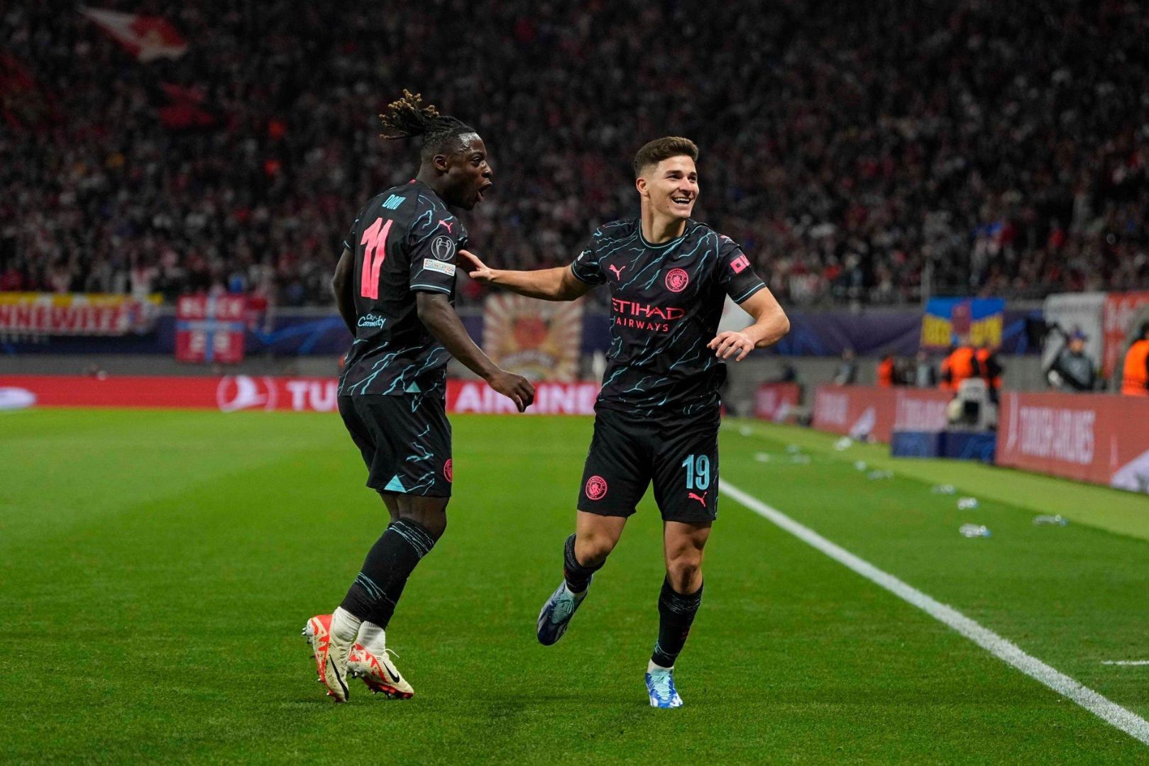 LEIPZIG, GERMANY - OCTOBER 4: Julián Álvarez of Manchester City celebrates during the UEFA Champions League match between RB Leipzig and Manchester City at Red Bull Arena on October 4, 2023 in Leipzig, Germany.