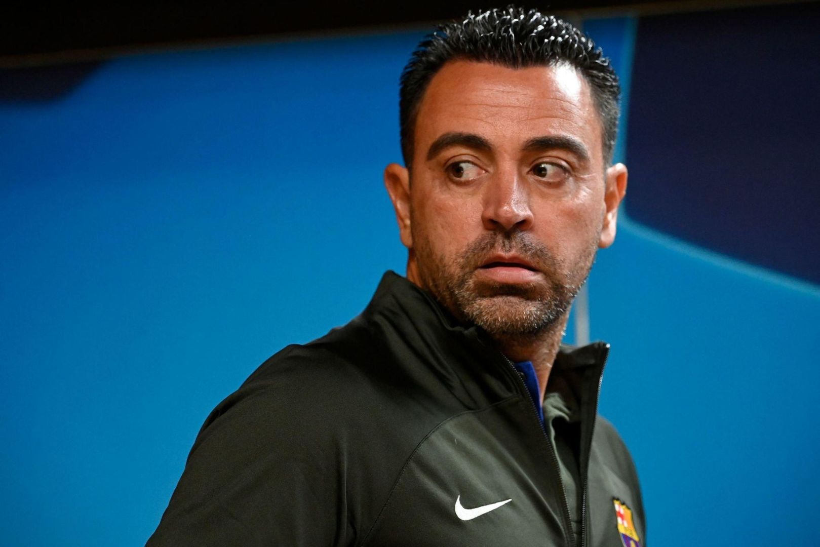 arcelona's Spanish coach Xavi looks on during a press conference at the Dragao stadium in Porto, on October 3, 2023, on the eve of the UEFA Champions League 1st round day 2 group H football match between FC Porto and FC Barcelona.