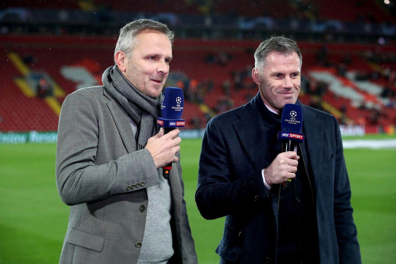 Television pundits Dietmar Hamann (left) and Jamie Carragher (right) working for European network Sky Sport pitchside before kick-off Liverpool v Bayern Munich - UEFA Champions League - Round of 16 - First Leg - Anfield 19-02-2019.
