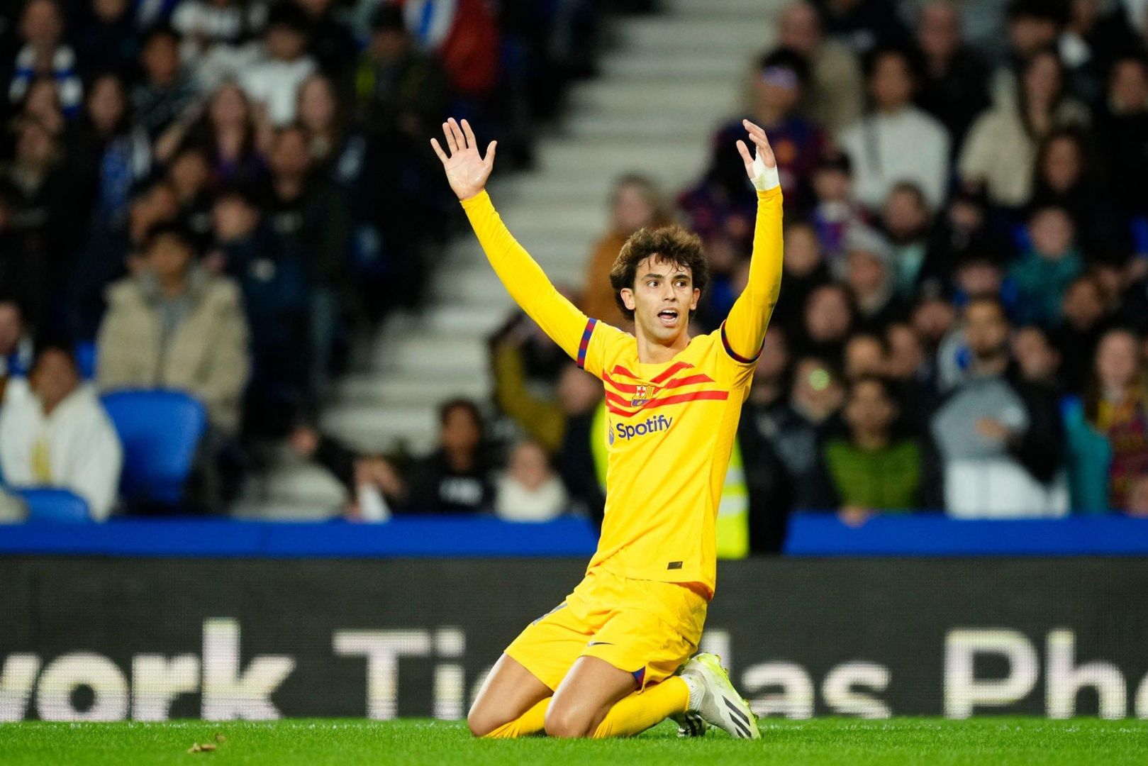 Joao Felix second striker of Barcelona and Portugal protest to referee during the LaLiga EA Sports match between Real Sociedad and FC Barcelona at Reale Arena on November 4, 2023 in San Sebastian, Spain.