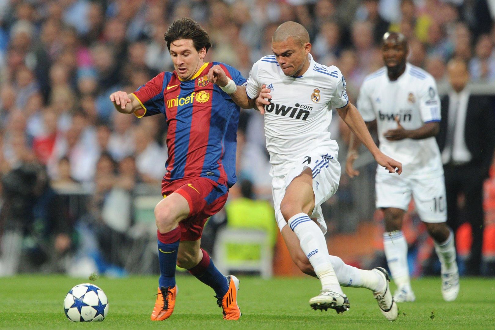 Pepe of Real Madrid and Lionel Messi of Barcelona during the UEFA Champions League Semi Final, 1st Leg match between Real Madrid and Barcelona at the Santiago Bernabeu Stadium in Madrid, Spain. | Location: Madrid, Spain.