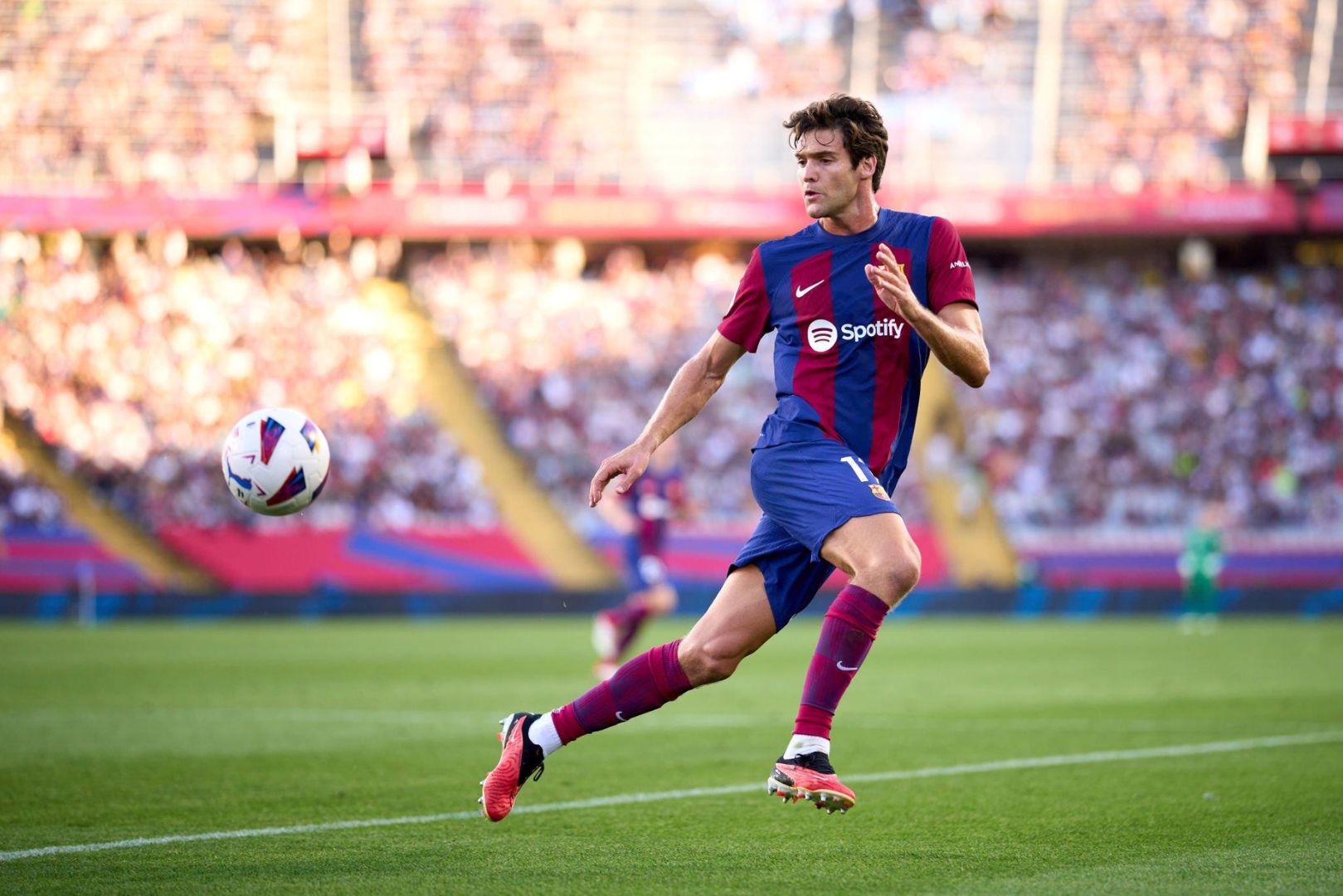 BARCELONA, SPAIN - SEPTEMBER 23: Marcos Alonso of FC Barcelona runs with the ball during the LaLiga EA Sports match between FC Barcelona and RC Celta at Estadi Olimpic Lluis Companys on September 23, 2023 in Barcelona, Spain.