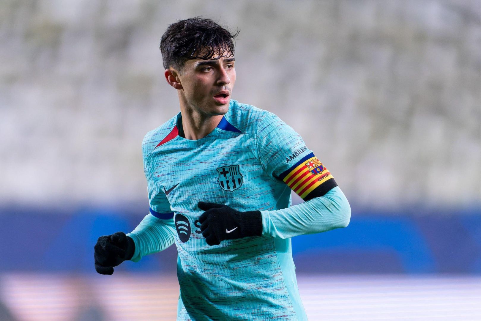 ANTWERPEN, BELGIUM - DECEMBER 13: Pedri of FC Barcelona looks on during the UEFA Champions League Group H match between Royal Antwerp FC and FC Barcelona at the Stadion Bosuil on December 13, 2023 in Antwerpen, Belgium.