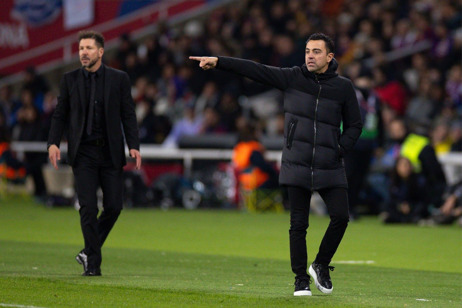 BARCELONA, SPAIN - DEC 3: Xavi Hernandez of FC Barcelona (R) during the Spanish 