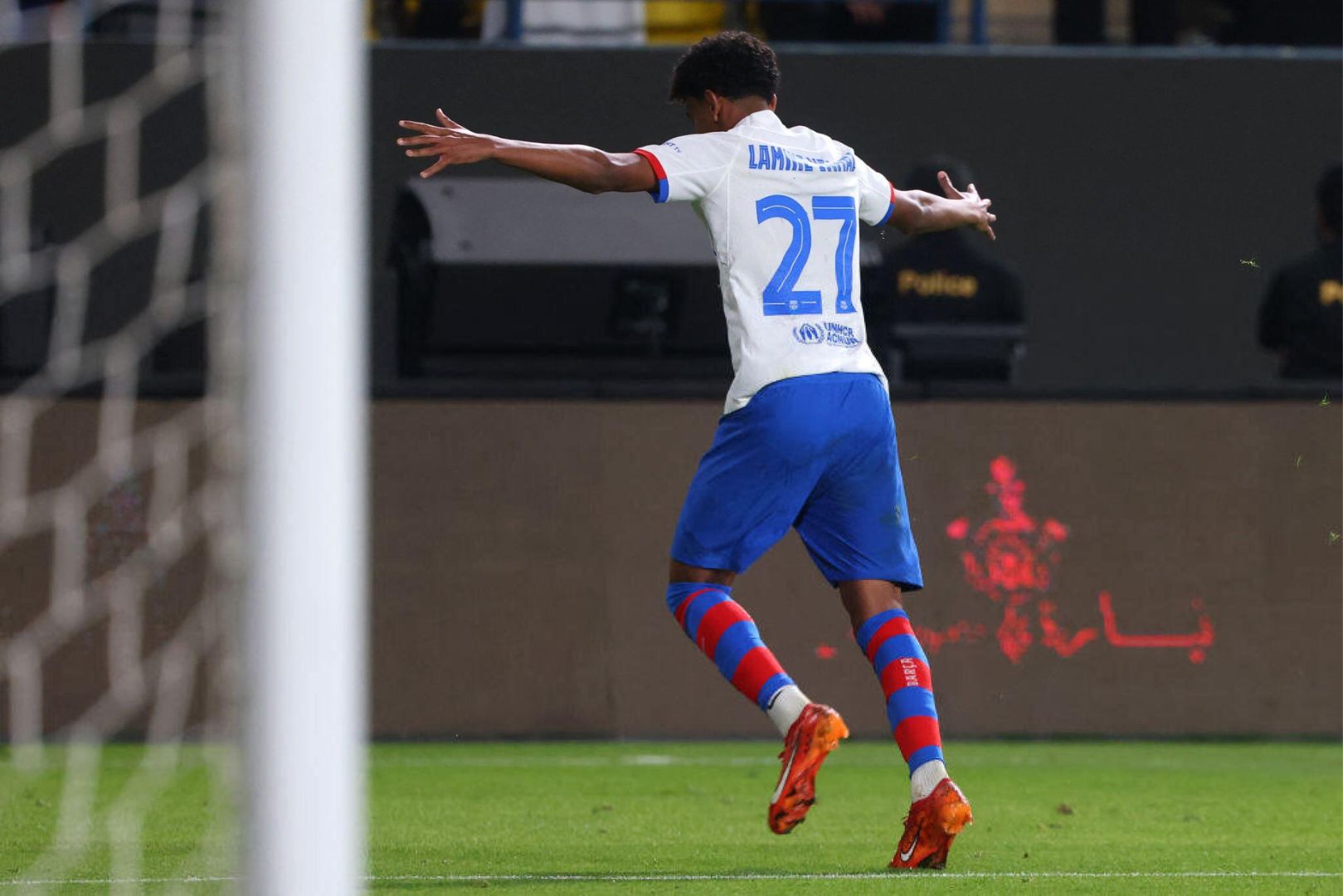 Barcelona's Spanish forward #27 Lamine Yamal celebrates scoring his team's second goal during the Spanish Super Cup semi-final football match between Barcelona and Osasuna at the Al-Awwal Park Stadium in Riyadh, on January 11, 2024.