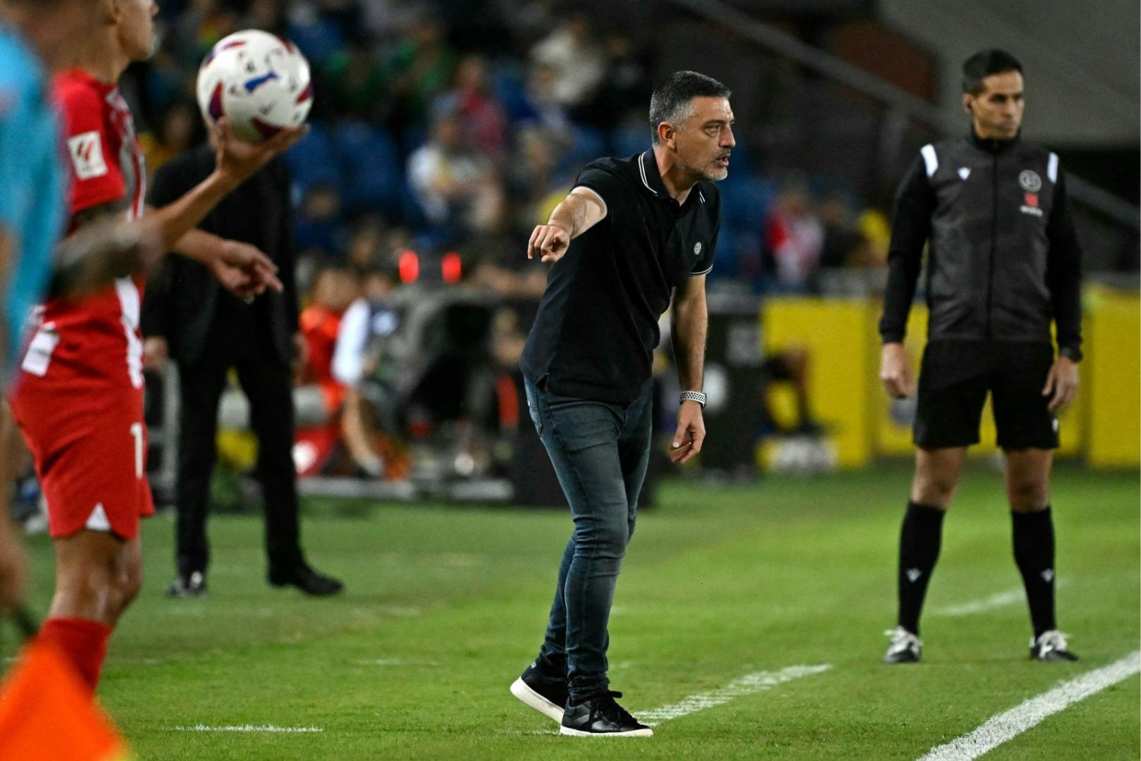 Las Palmas' Spanish coach and former Barcelona B coach Francisco Javier Garcia Pimienta gestures during the Spanish league football match between UD Las Palmas and Club Atletico de Madrid at the Gran Canaria stadium in Las Palmas de Gran Canaria on November 3, 2023.