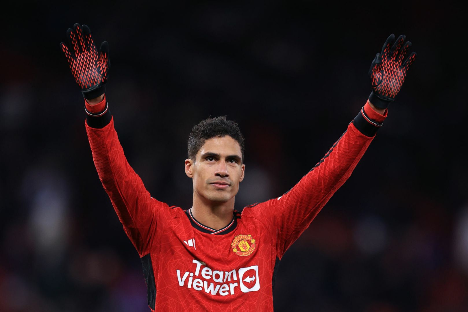 Raphael Varane of Manchester United waves after during the Premier League match between Manchester United and Aston Villa at Old Trafford on December 26, 2023 in Manchester, England.