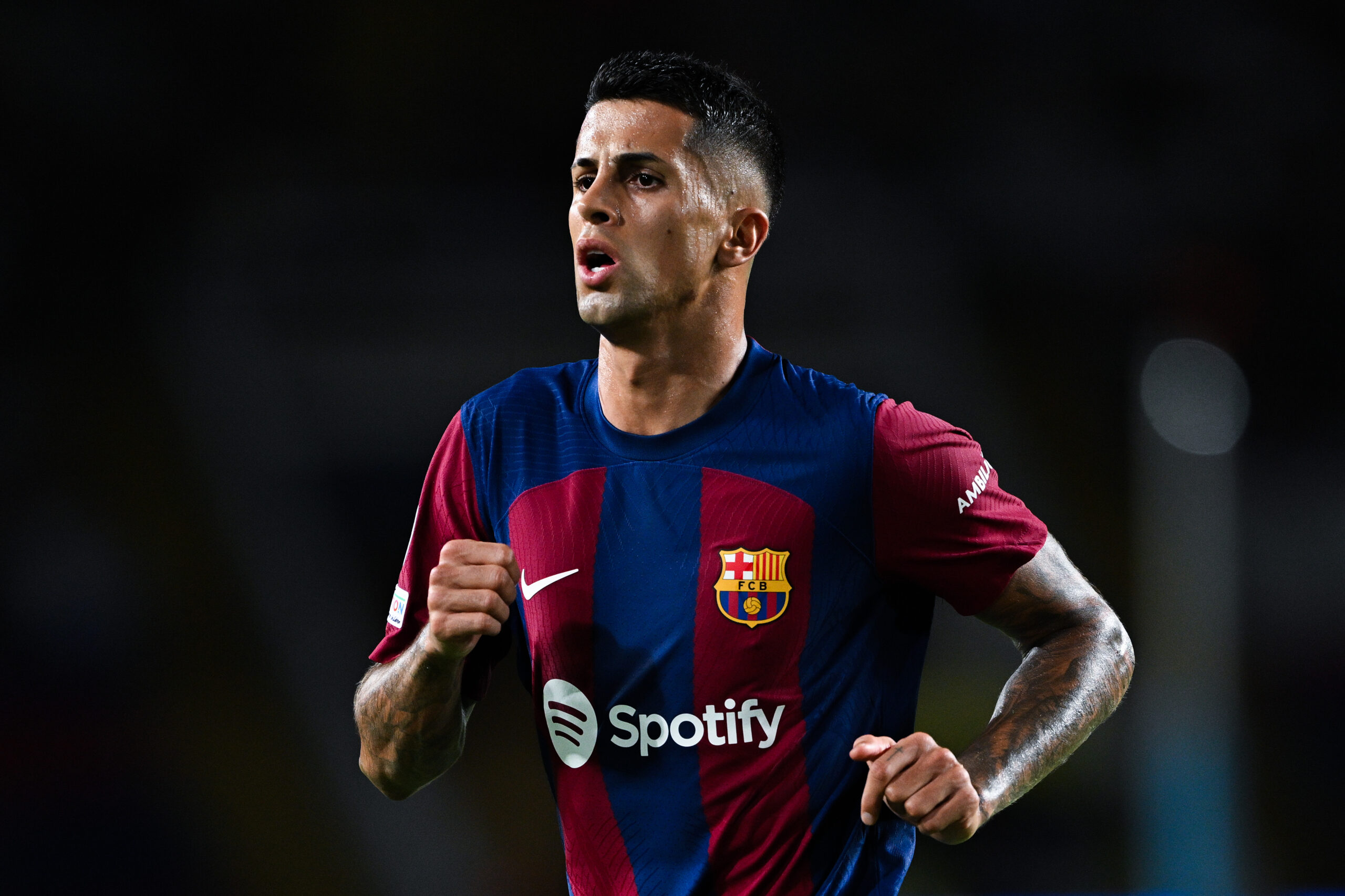 BARCELONA, SPAIN - SEPTEMBER 19: Joao Cancelo of FC Barcelona looks on during the UEFA Champions League match between FC Barcelona and Royal Antwerp FC at Estadi Olimpic Lluis Companys on September 19, 2023 in Barcelona, Spain.