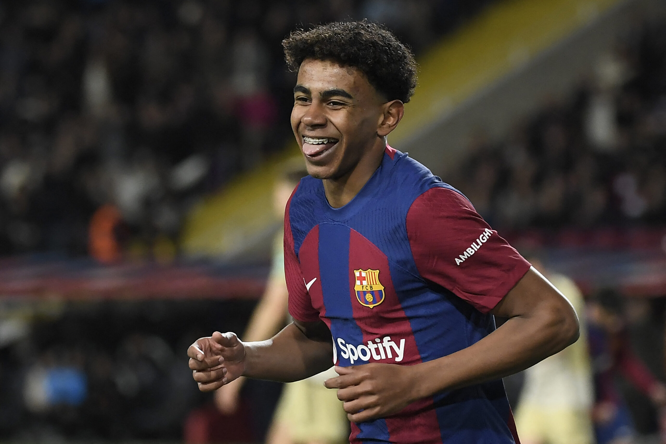 Barcelona's Spanish forward #27 Lamine Yamal celbrates scoring the opening goal during the Spanish league football match between FC Barcelona and Granada FC at the Estadi Olimpic Lluis Companys in Barcelona on February 11, 2024.
