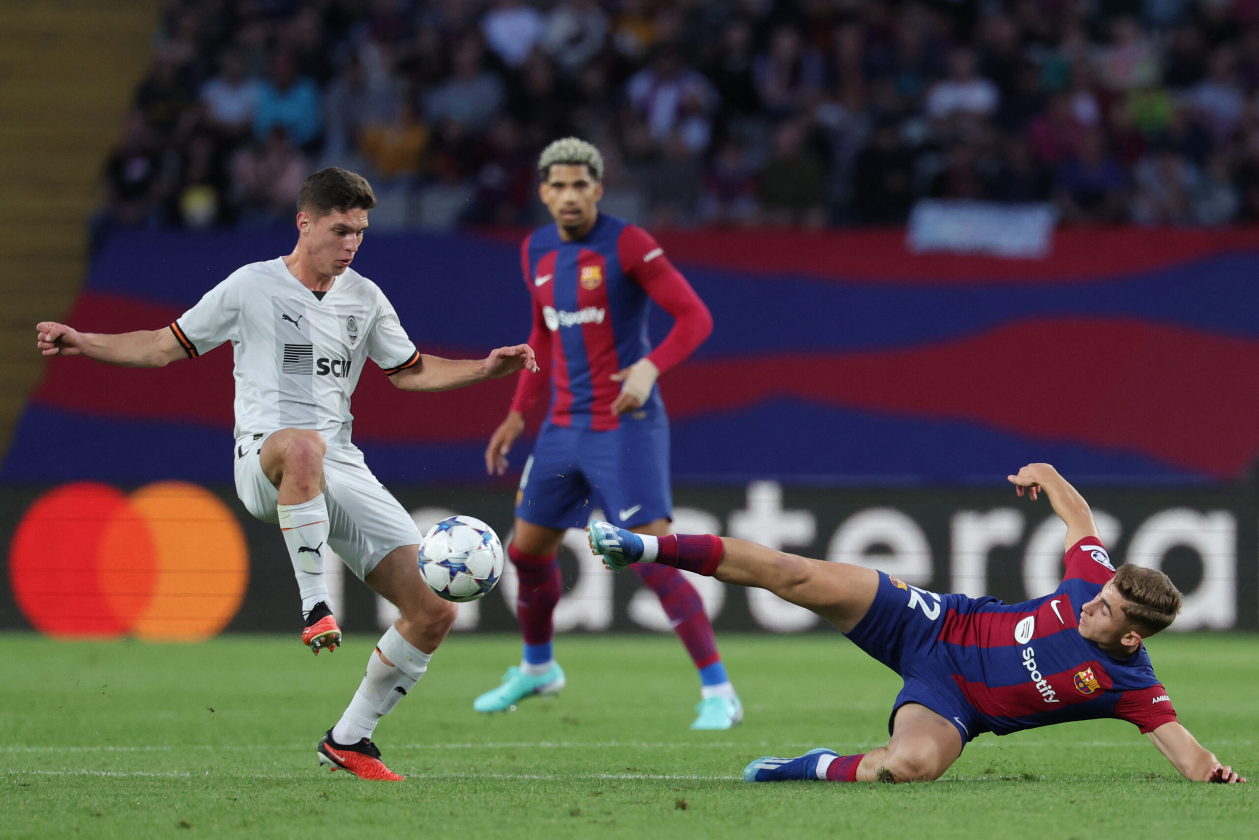 Shakhtar Donetsk's Ukrainian midfielder #10 Georgiy Sudakov vies with Barcelona's Spanish midfielder #32 Fermin Lopez during the UEFA Champions League 1st round Group H football match between FC Barcelona and Shakhtar Donetsk at the Estadi Olimpic Lluis Companys in Barcelona on October 25, 2023.