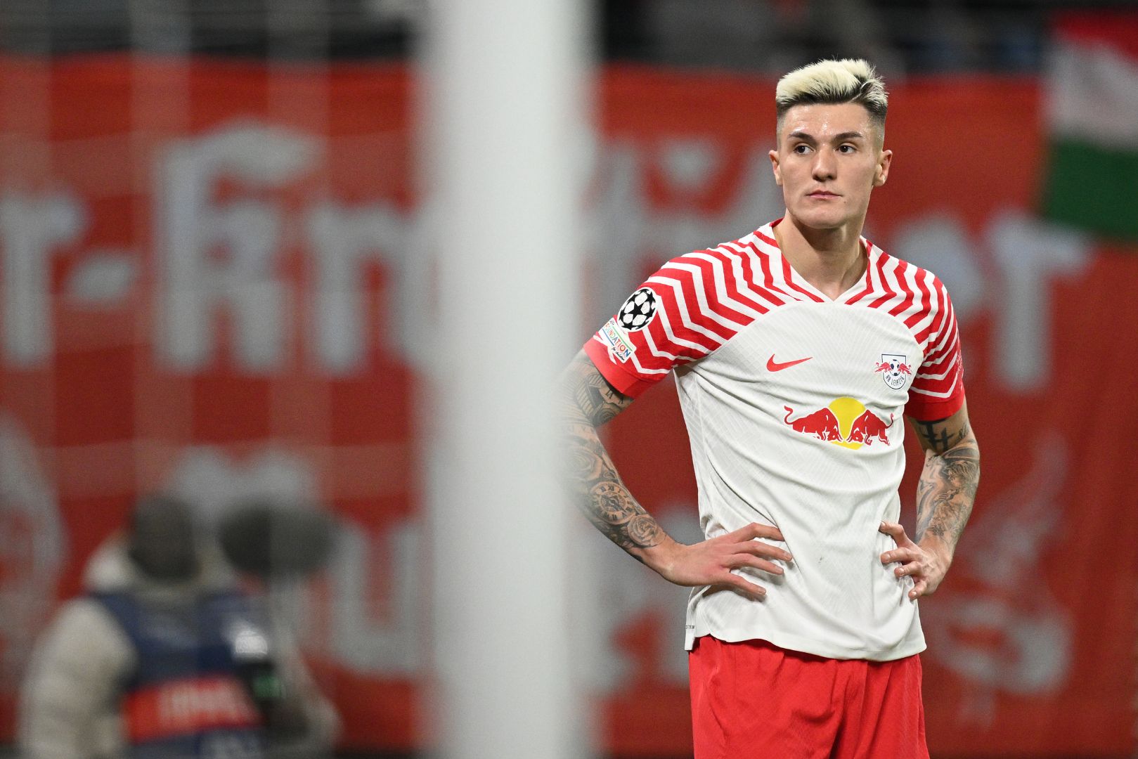 LEIPZIG, GERMANY - FEBRUARY 13: Benjamin Sesko of Leipzig reacts to a missed chance during the UEFA Champions League 2023/24 round of 16 first leg match between RB Leipzig and Real Madrid CF at Red Bull Arena on February 13, 2024 in Leipzig, Germany.
