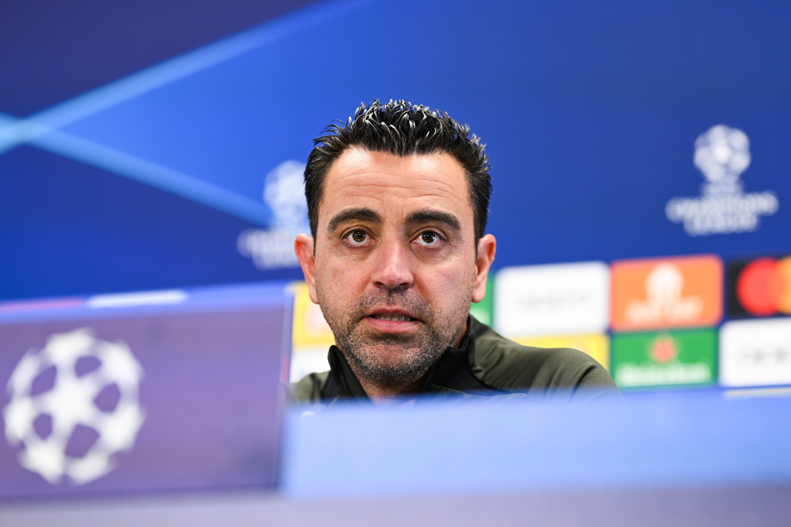 SANT JOAN DESPI, SPAIN - APRIL 15: Head Coach Xavi Hernandez of FC Barcelona faces the media during a press conference ahead of their UEFA Champions league Quarter Final 2nd leg match against Paris Saint Germain at Ciutat Esportiva Joan Gamper on April 15, 2024 in Sant Joan Despi, Spain.