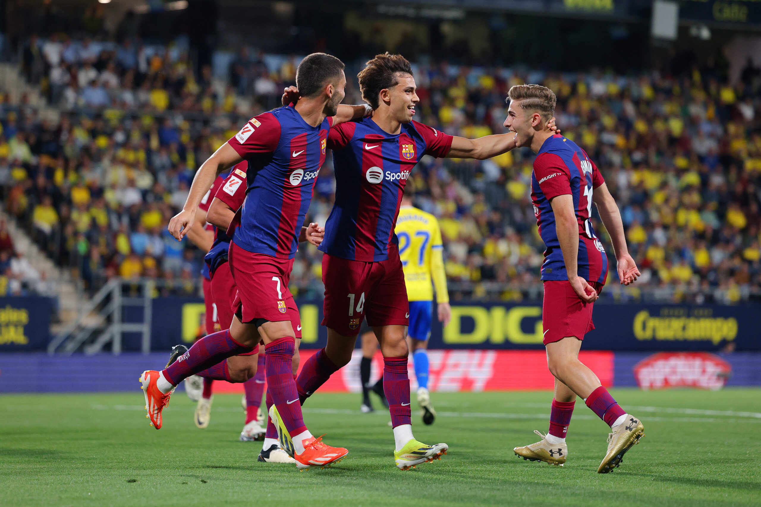 CADIZ, SPAIN - APRIL 13: Joao Felix of FC Barcelona celebrates scoring his team's first goal with teammates Ferran Torres (L) and Fermin Lopez of FC Barcelona (R) during the LaLiga EA Sports match between Cadiz CF and FC Barcelona at Estadio Nuevo Mirandilla on April 13, 2024 in Cadiz, Spain.