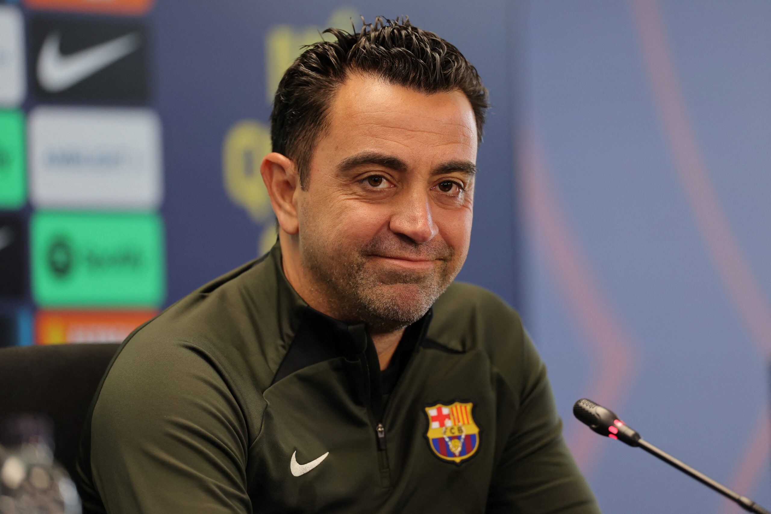 Barcelona's Spanish coach Xavi addresses a press conference at the Joan Gamper training ground in Sant Joan Despi, near Barcelona, on April 25, 2024. Xavi will remain as coach of Barcelona, the Spanish giants told AFP on April 24, despite having announced in January that he planned to quit at the end of the season due to the 