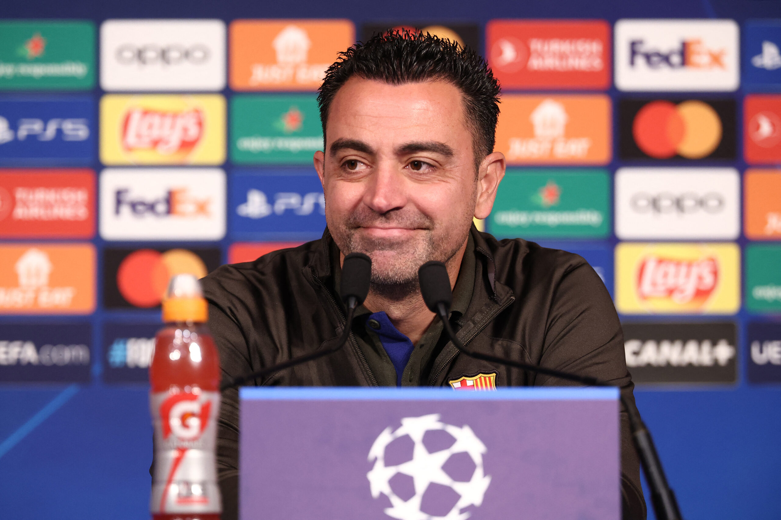 Barcelona's Spanish coach Xavi gives a press conference at the Parc des Princes stadium in Paris on April 9, 2024, on the eve of their UEFA Champions League quarter final first leg football match against Paris Saint-Germain.