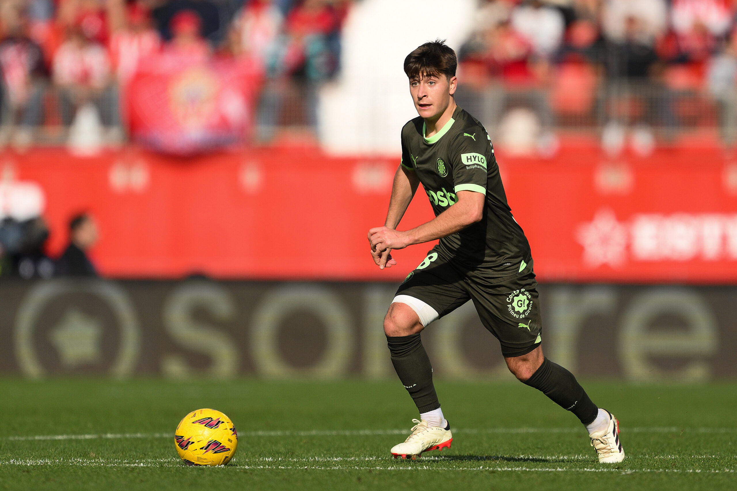 ALMERIA, SPAIN - JANUARY 14: Pablo Torre of Girona FC runs with the ball during the LaLiga EA Sports match between UD Almeria and Girona FC at the Power Horse Stadium on January 14, 2024 in Almeria, Spain.