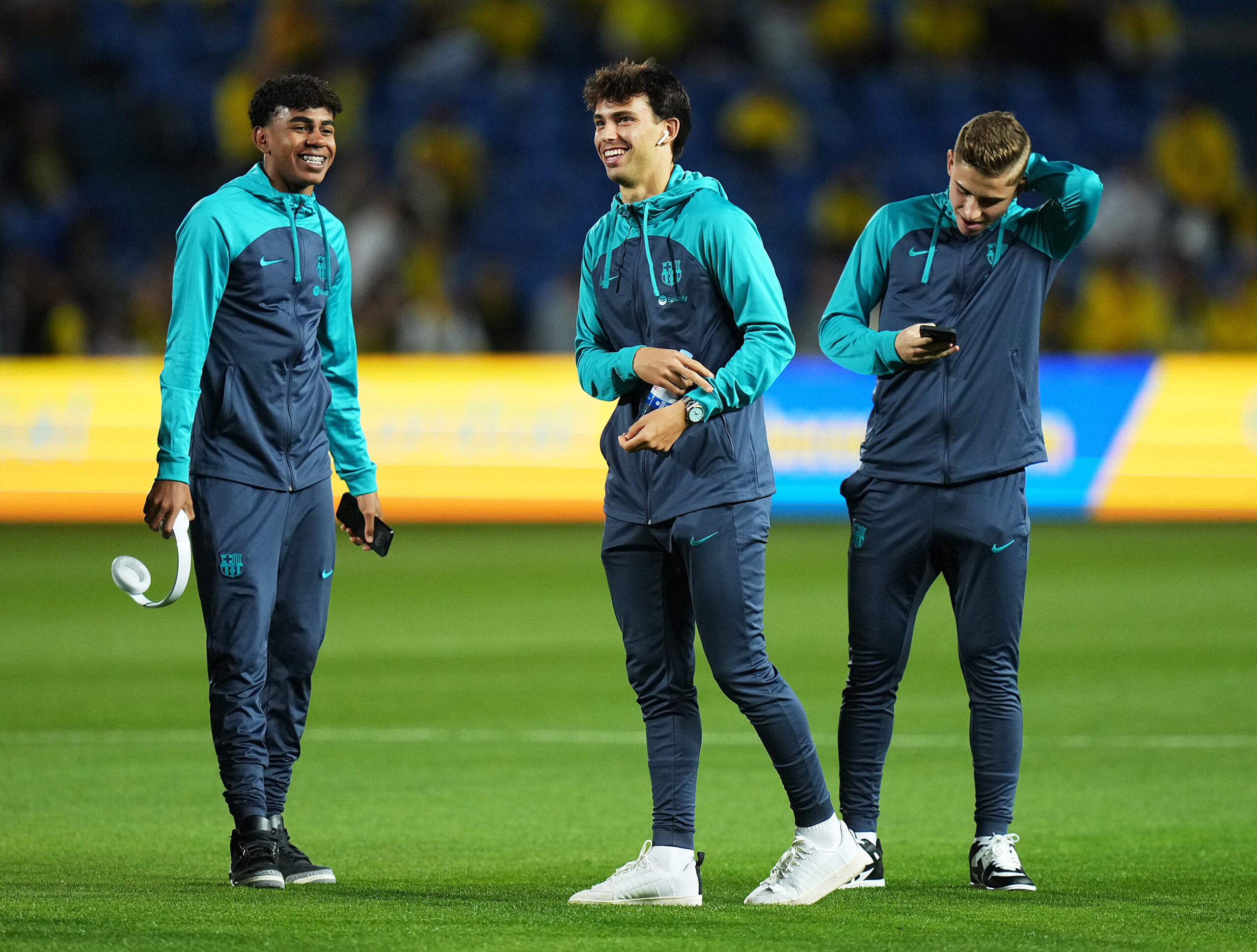 LAS PALMAS, SPAIN - JANUARY 04: Lamine Yamal (L) and Joao Felix of FC Barcelona (C) interact on pitch prior to the LaLiga EA Sports match between UD Las Palmas and FC Barcelona at Estadio Gran Canaria on January 04, 2024 in Las Palmas, Spain.