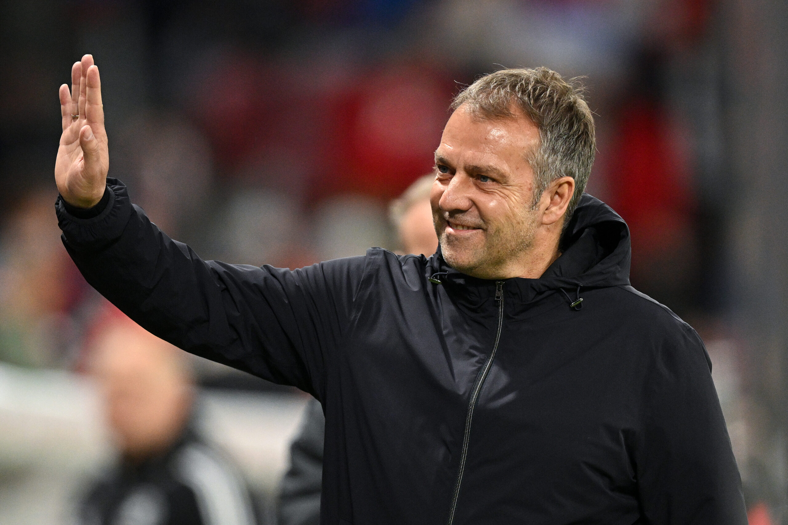 MAINZ, GERMANY - MARCH 25: Hansi Flick, Head Coach of Germany greets the crowd prior to an international friendly match between Germany and Peru at MEWA Arena on March 25, 2023 in Mainz, Germany.