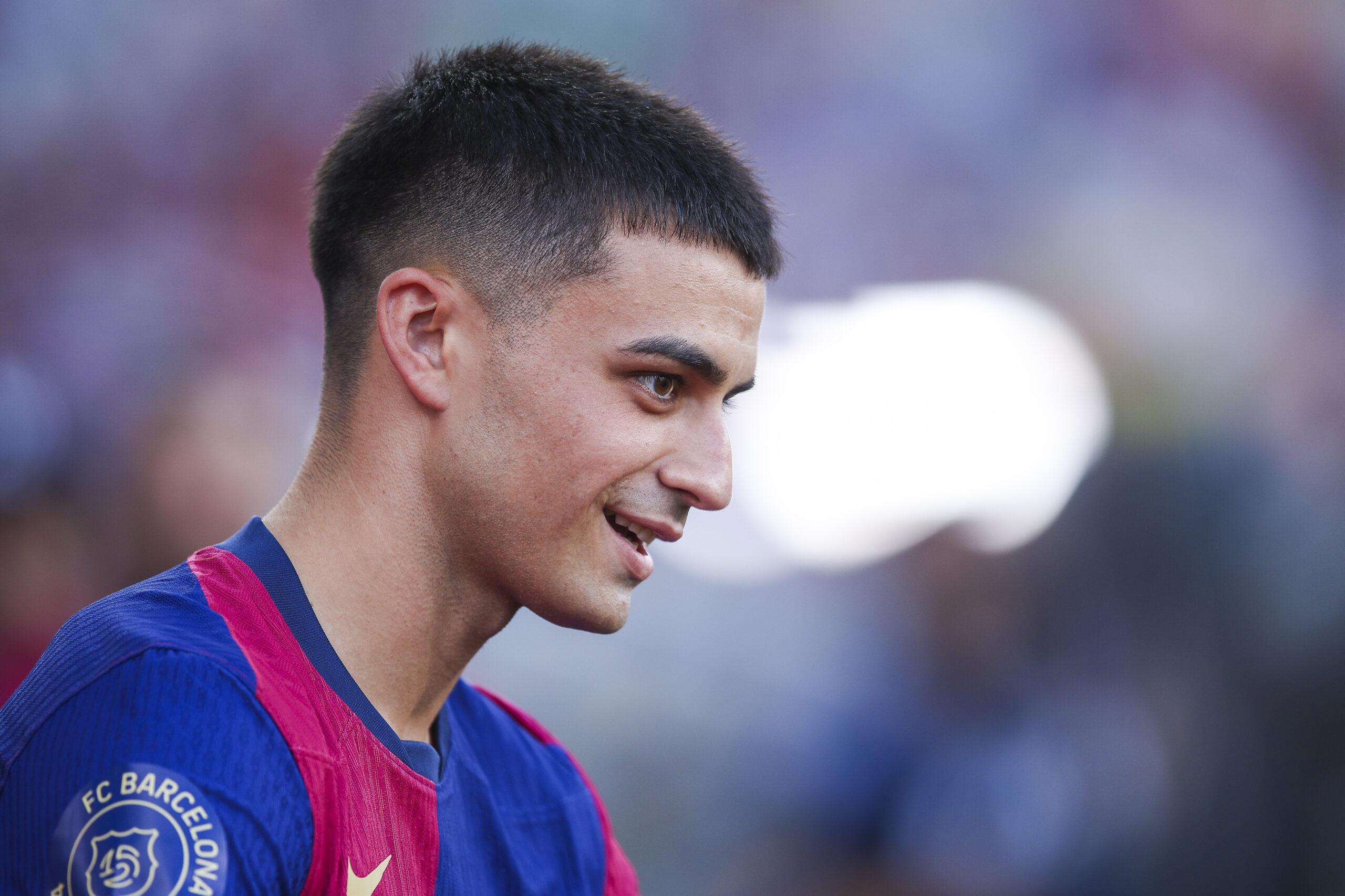 BARCELONA, SPAIN - AUGUST 12: Pedro 'Pedri' Gonzalez of FC Barcelona looks on prior to the Joan Gamper Trophy match between FC Barcelona and AS Monaco at Estadi Olimpic Lluis Companys on August 12, 2024 in Barcelona, Spain.