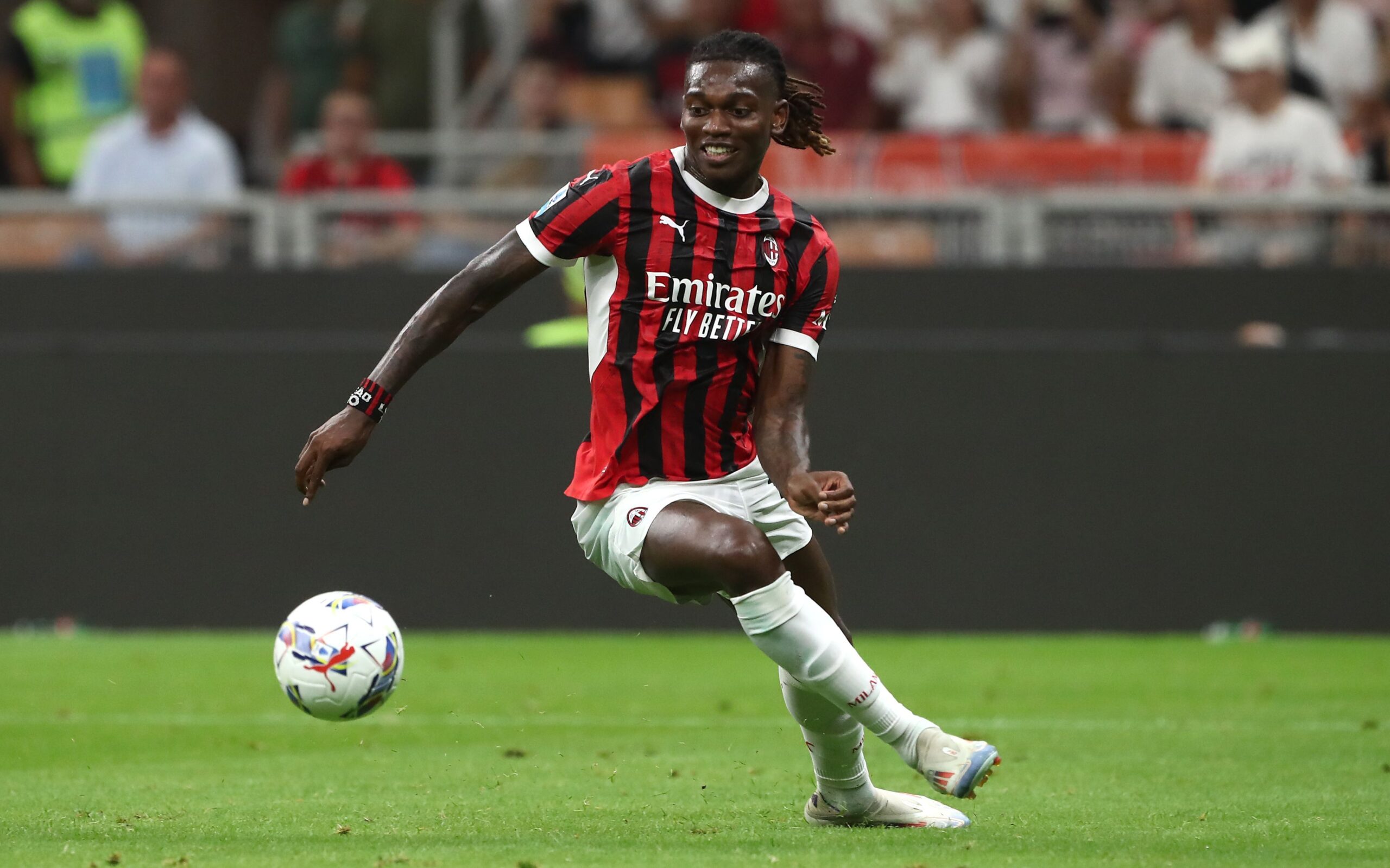 MILAN, ITALY - AUGUST 17: Rafael Leao of AC Milan in action during the Serie A match between AC Milan and Torino FC at Stadio Giuseppe Meazza on August 17, 2024 in Milan, Italy.