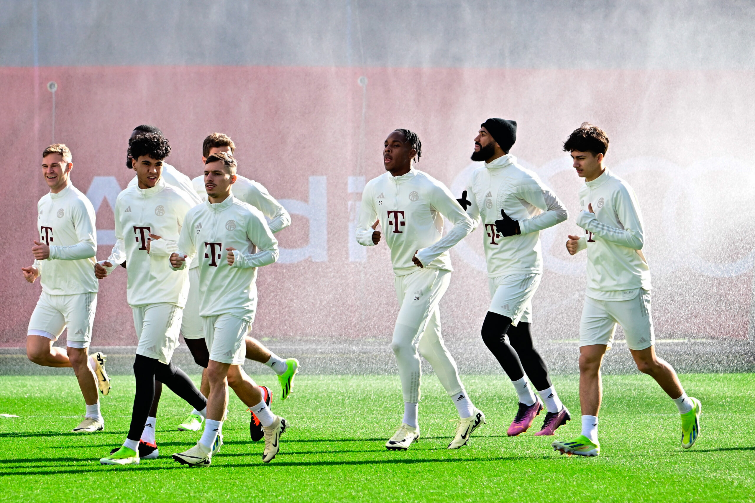 Bayern Munich's German midfielder #06 Joshua Kimmich (L), Bayern Munich's Spanish forward #17 Bryan Zaragoza (3L), Bayern Munich's French forward #39 Mathys Tel (3R), Bayern Munich's Cameroonian forward #13 Eric Maxim Choupo-Moting (2ndR) and other players attend a training session of German club FC Bayern Munich in Munich, southern Germany on February 13, 2024, one day ahead of the UEFA Champions League round of 16 first leg football match between S S Lazio and Bayern Munich to be played in Rome.