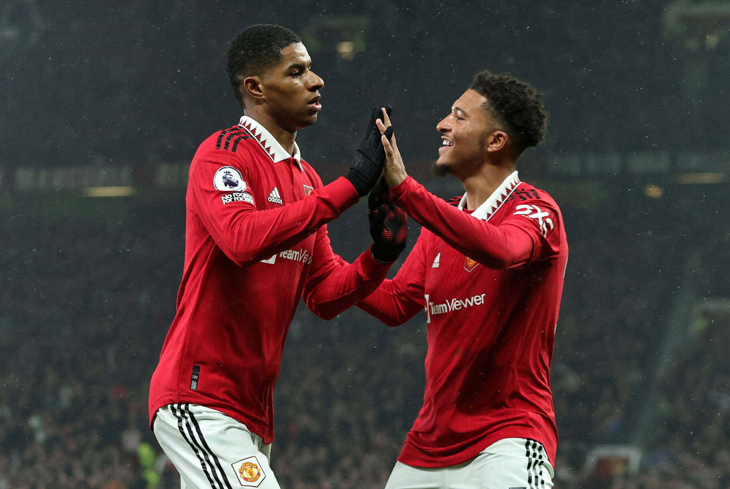 MANCHESTER, ENGLAND - APRIL 05: Marcus Rashford of Manchester United celebrates with teammate Jadon Sancho after scoring the team's first goal during the Premier League match between Manchester United and Brentford FC at Old Trafford on April 05, 2023 in Manchester, England.