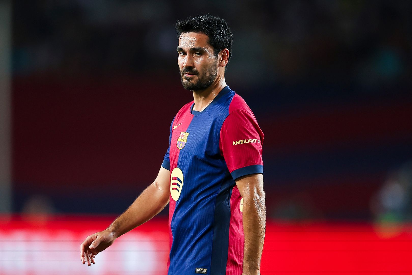 BARCELONA, SPAIN - AUGUST 12: Ilkay Gundogan of FC Barcelona looks on during the Joan Gamper Trophy match between FC Barcelona and AS Monaco at Estadi Olimpic Lluis Companys on August 12, 2024 in Barcelona, Spain.