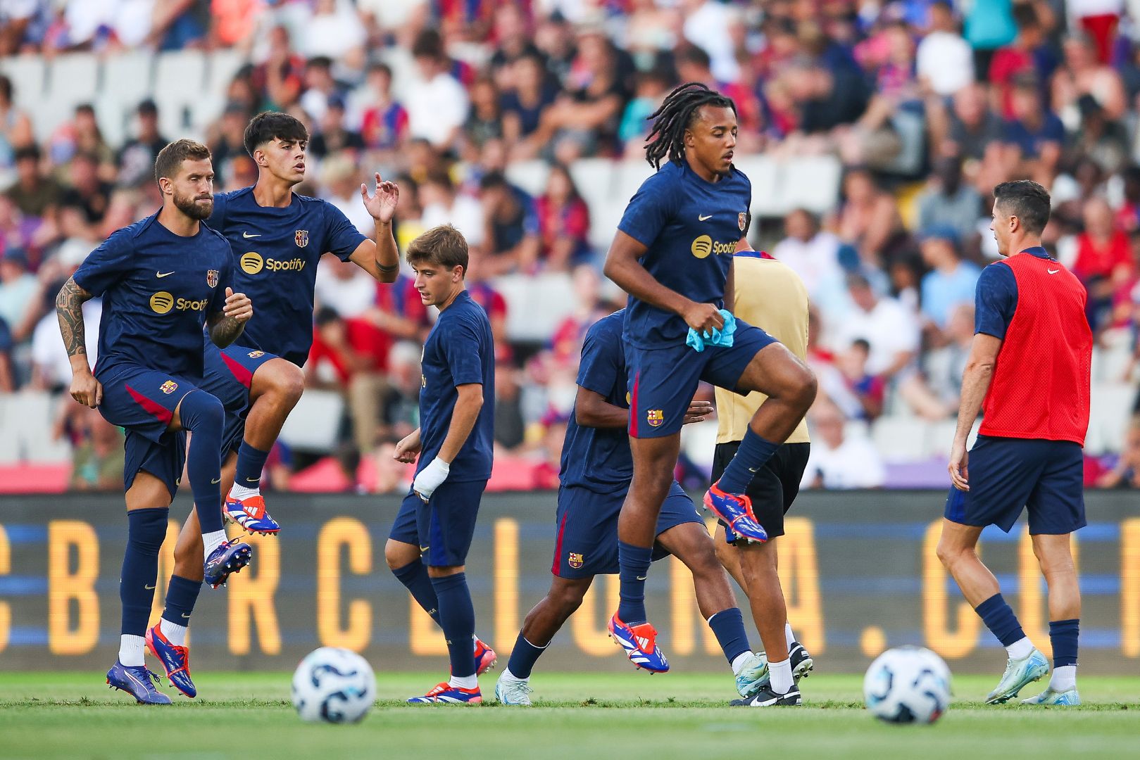 BARCELONA, SPAIN - AUGUST 12: Jules Kounde of FC Barcelona warm up prior to the Joan Gamper Trophy match between FC Barcelona and AS Monaco at Estadi Olimpic Lluis Companys on August 12, 2024 in Barcelona, Spain.