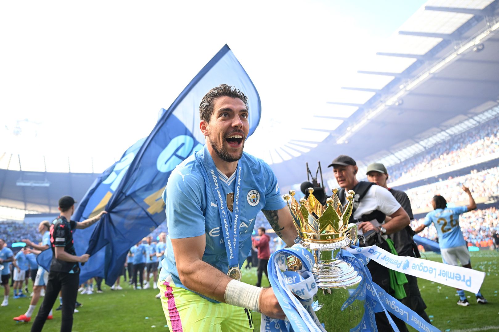 MANCHESTER, ENGLAND - MAY 19: Stefan Ortega of Manchester City celebrates with the Premier League Trophy after their team's victory in the Premier League match between Manchester City and West Ham United at Etihad Stadium on May 19, 2024 in Manchester, England.