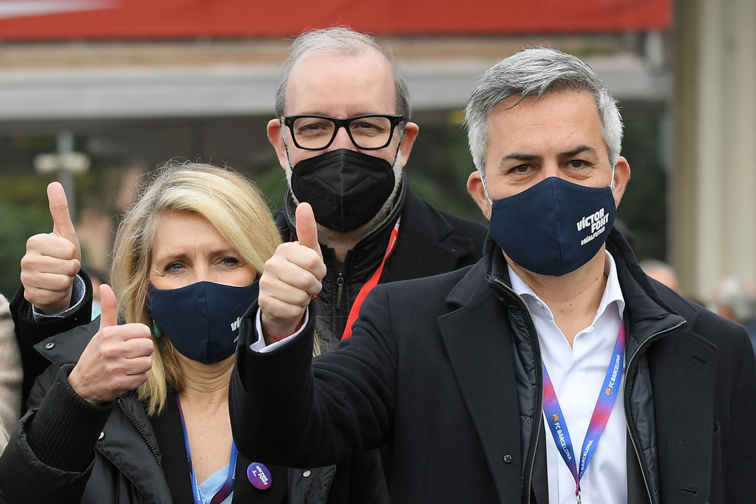 Candidate for Barcelona presidency Victor Font (R) poses after voting for FC Barcelona presidential election on March 07, 2021 outside the Camp Nou stadium in Barcelona.