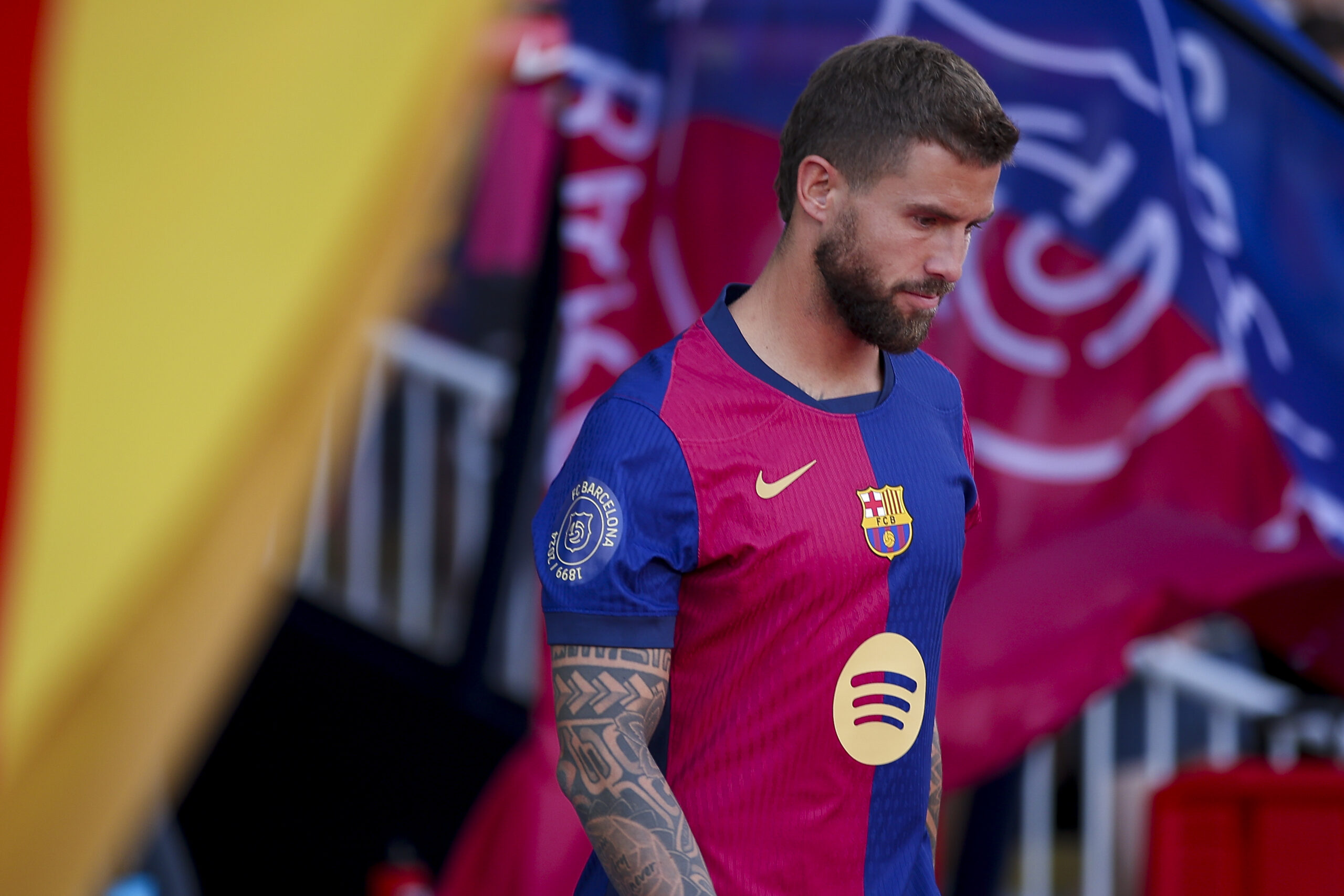BARCELONA, SPAIN - AUGUST 12: Inigo Martinez of FC Barcelona looks on prior to the Joan Gamper Trophy match between FC Barcelona and AS Monaco at Estadi Olimpic Lluis Companys on August 12, 2024 in Barcelona, Spain.
