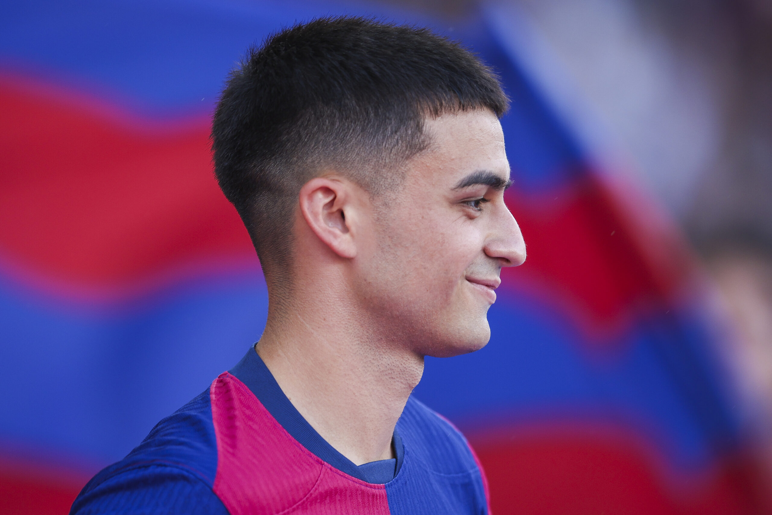 BARCELONA, SPAIN - AUGUST 12: Pedro 'Pedri' Gonzalez of FC Barcelona looks on prior to the Joan Gamper Trophy match between FC Barcelona and AS Monaco at Estadi Olimpic Lluis Companys on August 12, 2024 in Barcelona, Spain.