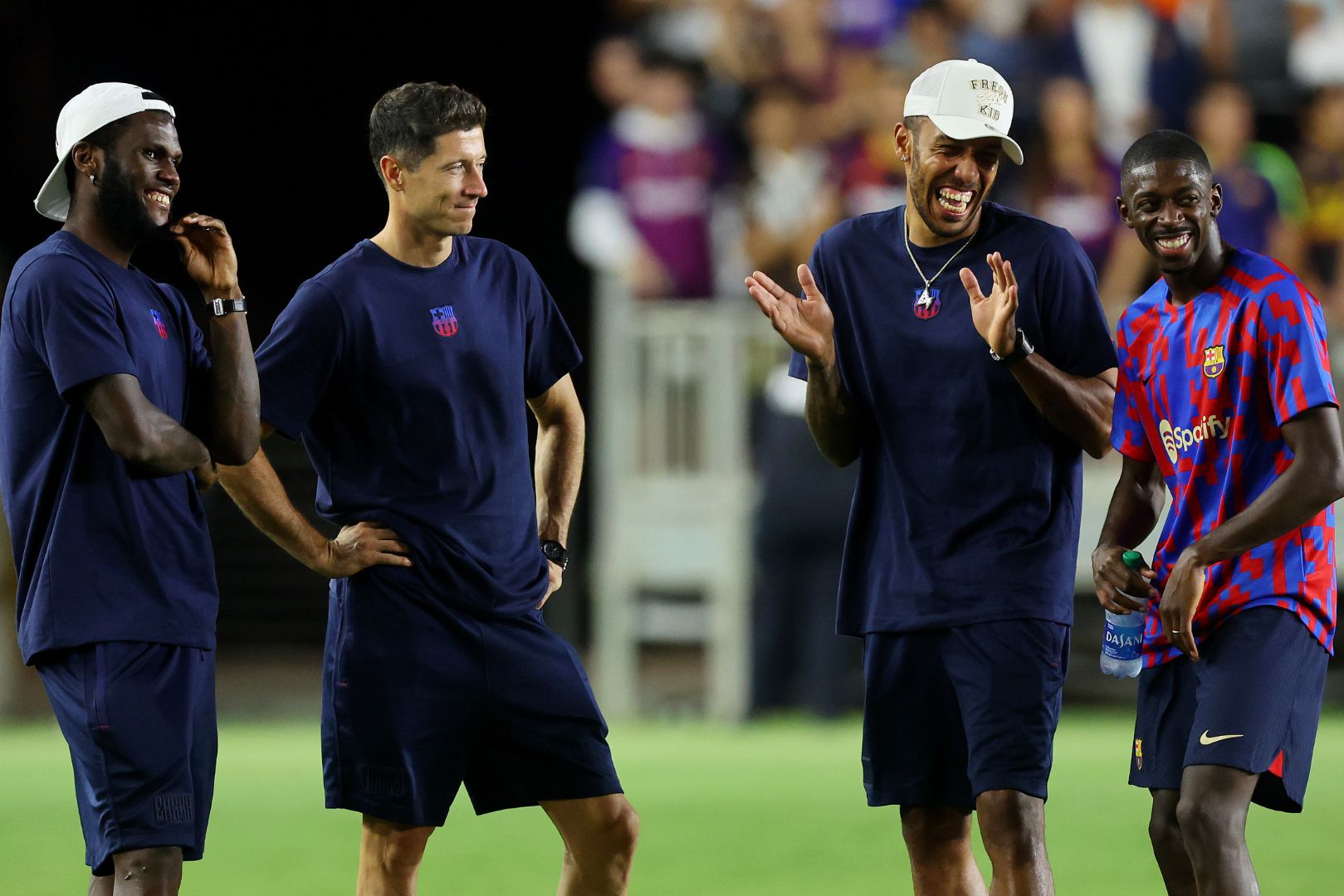 FORT LAUDERDALE, FLORIDA - JULY 19: (L-R) Franck Kessie, Robert Lewandowski, Pierre-Emerick Aubameyang and Ousmane Dembele of FC Barcelona react after a preseason friendly against Inter Miami CF at DRV PNK Stadium on July 19, 2022 in Fort Lauderdale, Florida. FC Barcelona won 6-0.