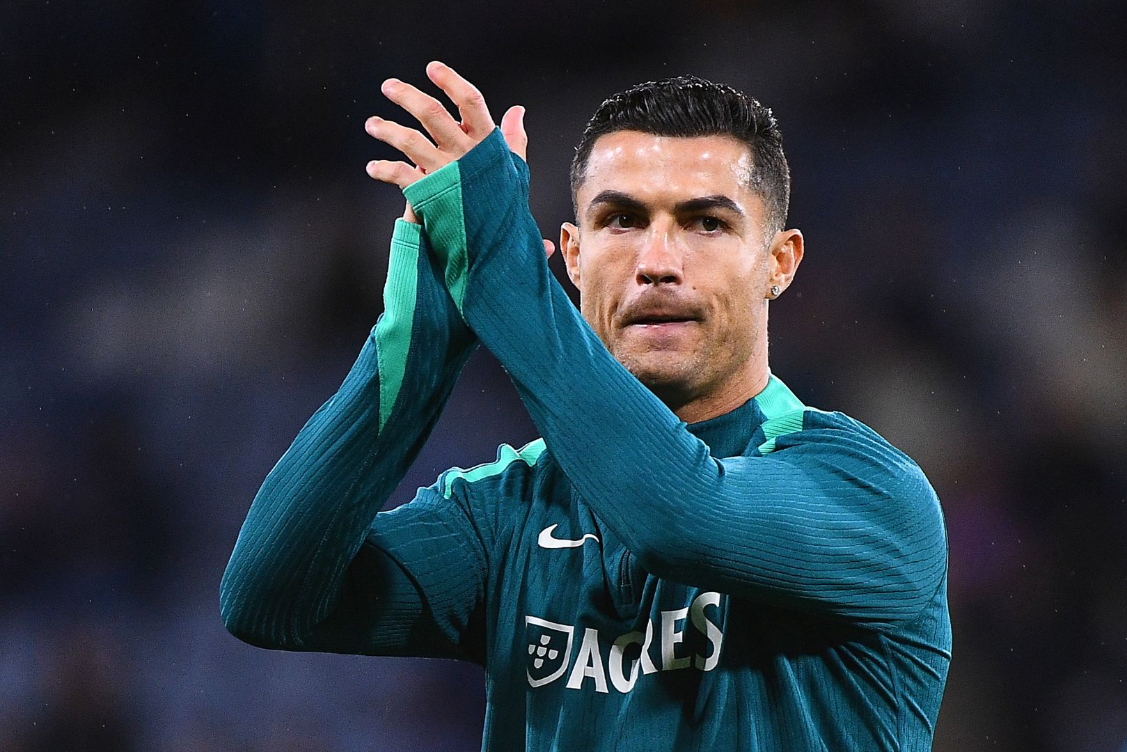 GLASGOW, SCOTLAND - OCTOBER 15: Cristiano Ronaldo of Portugal applauds the fans during the warm up prior to the UEFA Nations League 2024/25 League A Group A1 match between Scotland and Portugal at on October 15, 2024 in Glasgow, Scotland.
