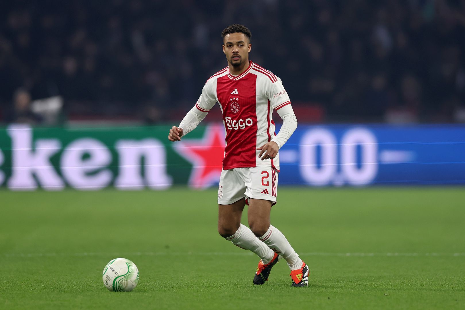 AMSTERDAM, NETHERLANDS - MARCH 07: Devyne Rensch of Ajax runs with the ball during the UEFA Europa Conference League 2023/24 round of 16 first leg match between AFC Ajax and Aston Villa at Johan Cruijff Arena on March 07, 2024 in Amsterdam, Netherlands.