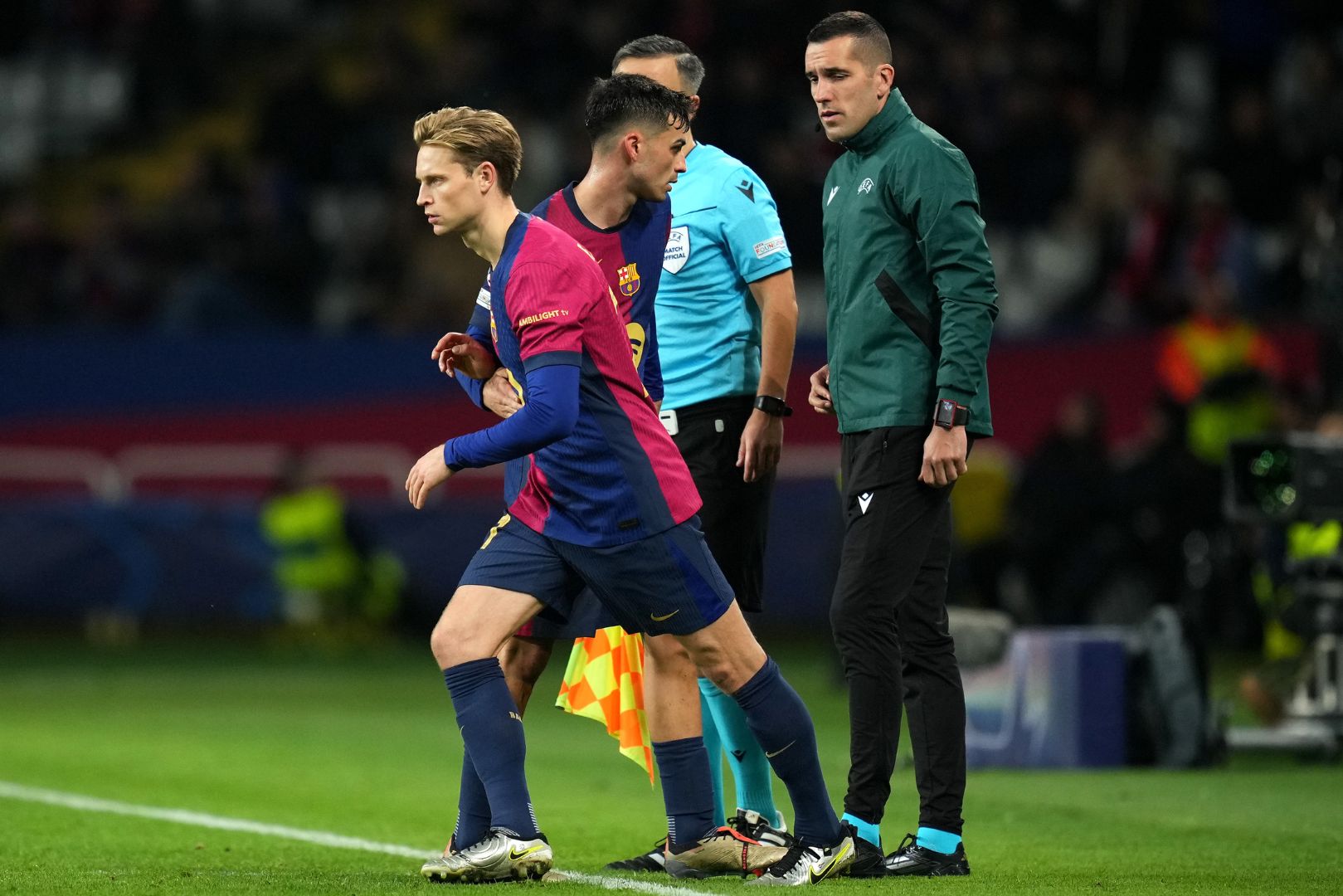 BARCELONA, SPAIN - NOVEMBER 26: Pedri of FC Barcelona is substituted for teammate Frenkie de Jong during the UEFA Champions League 2024/25 League Phase MD5 match between FC Barcelona and Stade Brestois 29 at Estadi Olimpic Lluis Companys on November 26, 2024 in Barcelona, Spain.