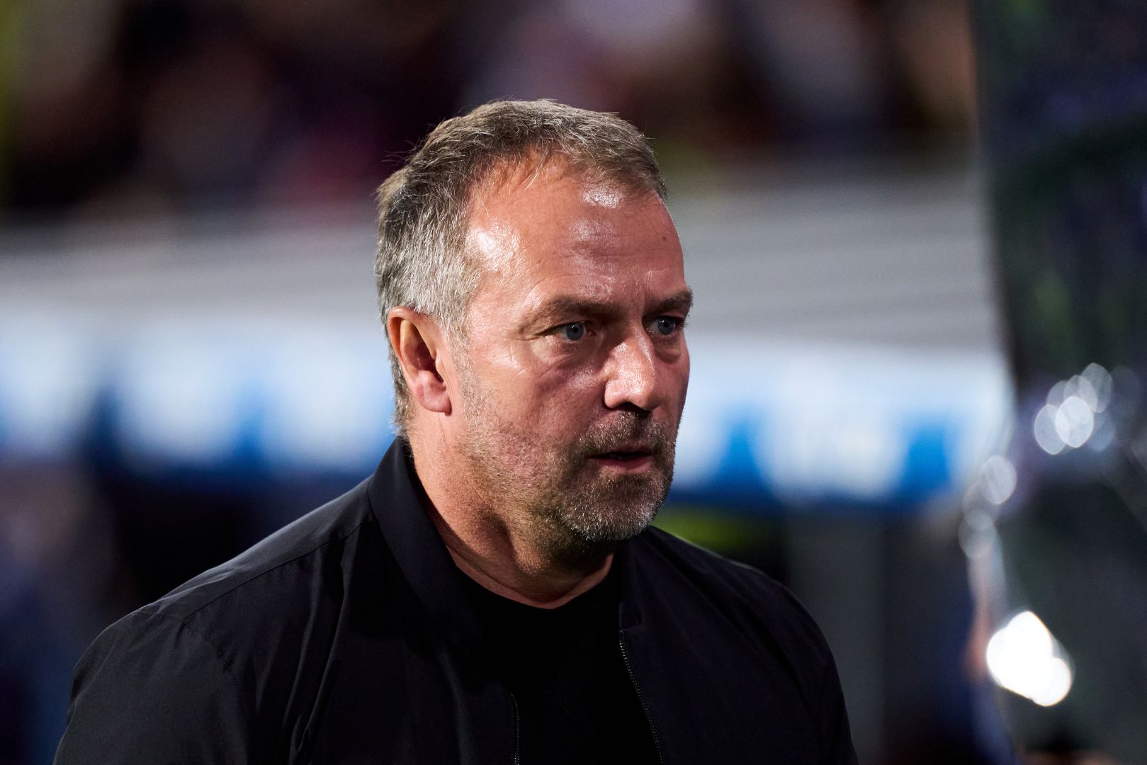 SAN SEBASTIAN, SPAIN - NOVEMBER 10: Head coach Hansi Flick of FC Barcelona looks on prior to the LaLiga match between Real Sociedad and FC Barcelona at Reale Arena on November 10, 2024 in San Sebastian, Spain.
