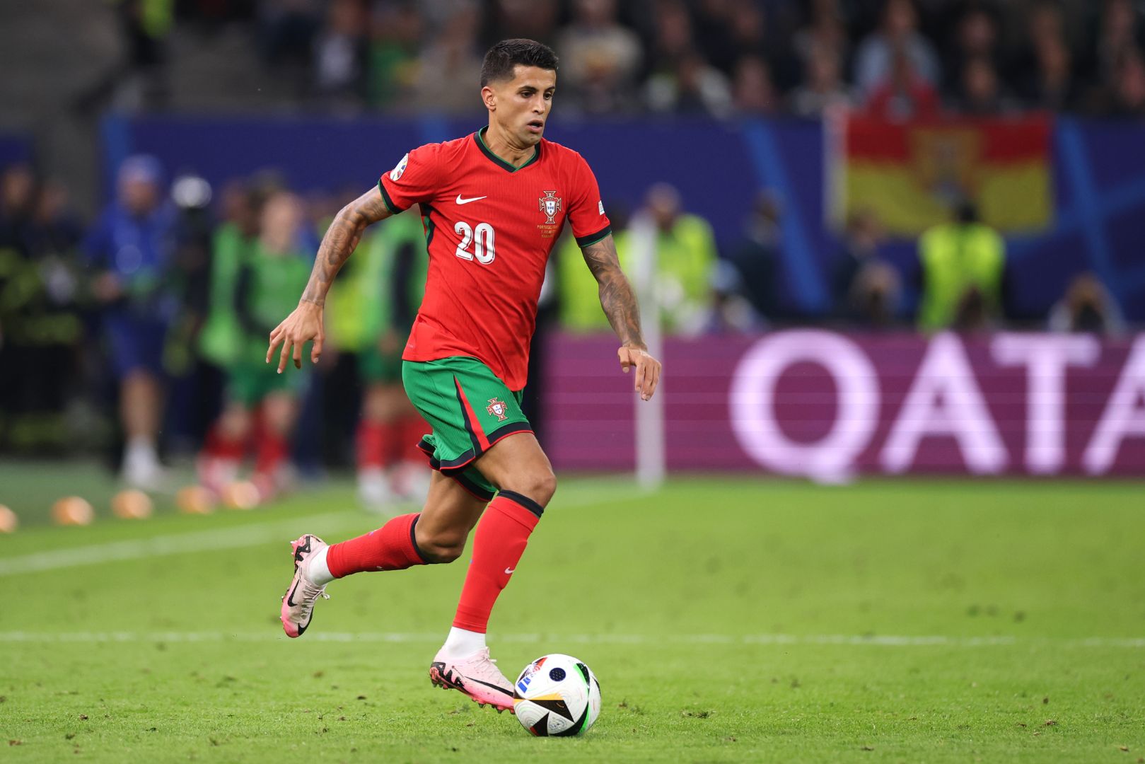 HAMBURG, GERMANY - JULY 05: Joao Cancelo of Portugal controls the ball during the UEFA EURO 2024 quarter-final match between Portugal and France at Volksparkstadion on July 05, 2024 in Hamburg, Germany.