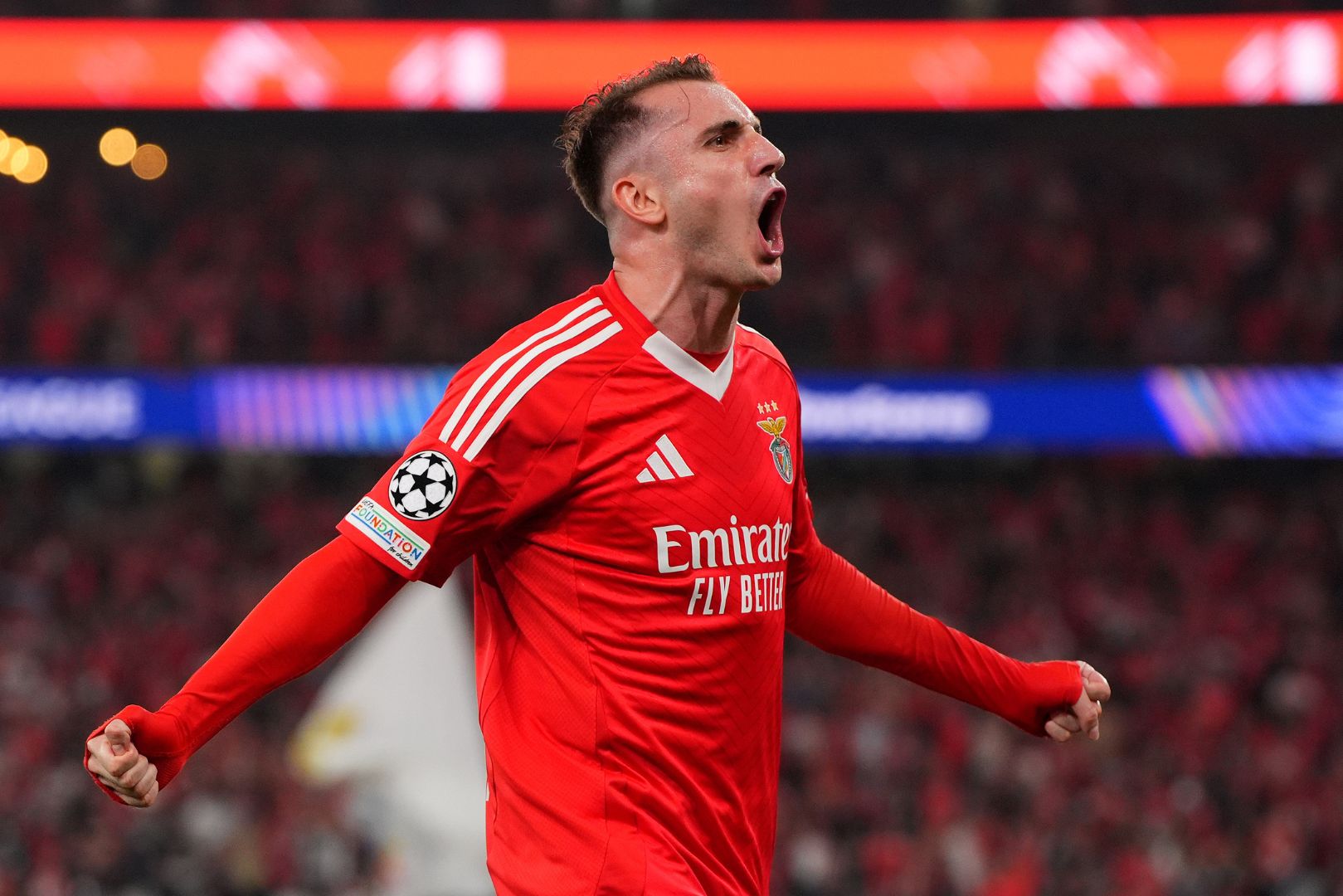 LISBON, PORTUGAL - OCTOBER 02: Kerem Akturkoglu of S.L Benfica celebrates scoring his team's first goal during the UEFA Champions League 2024/25 League Phase MD2 match between SL Benfica and Atletico de Madrid at on October 02, 2024 in Lisbon, Portugal.