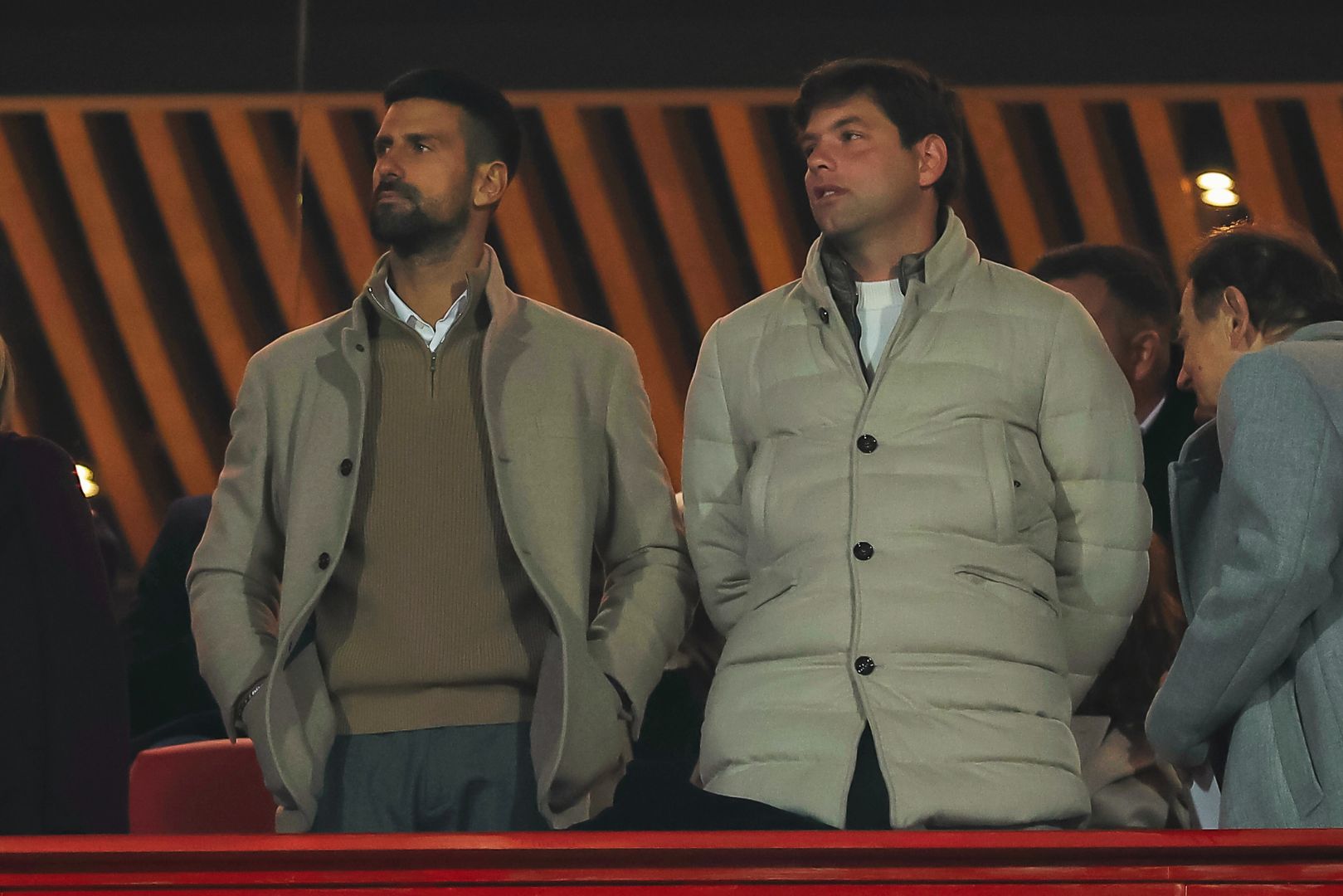 BELGRADE, SERBIA - NOVEMBER 6: Tennis players Novak Djokovic (L) and Filip Krajinovic (R) of Serbia attend the UEFA Champions League 2024/25 League Phase MD4 match between FK Crvena Zvezda and FC Barcelona at Stadium Rajko Mitic on November 6, 2024 in Belgrade, Serbia.