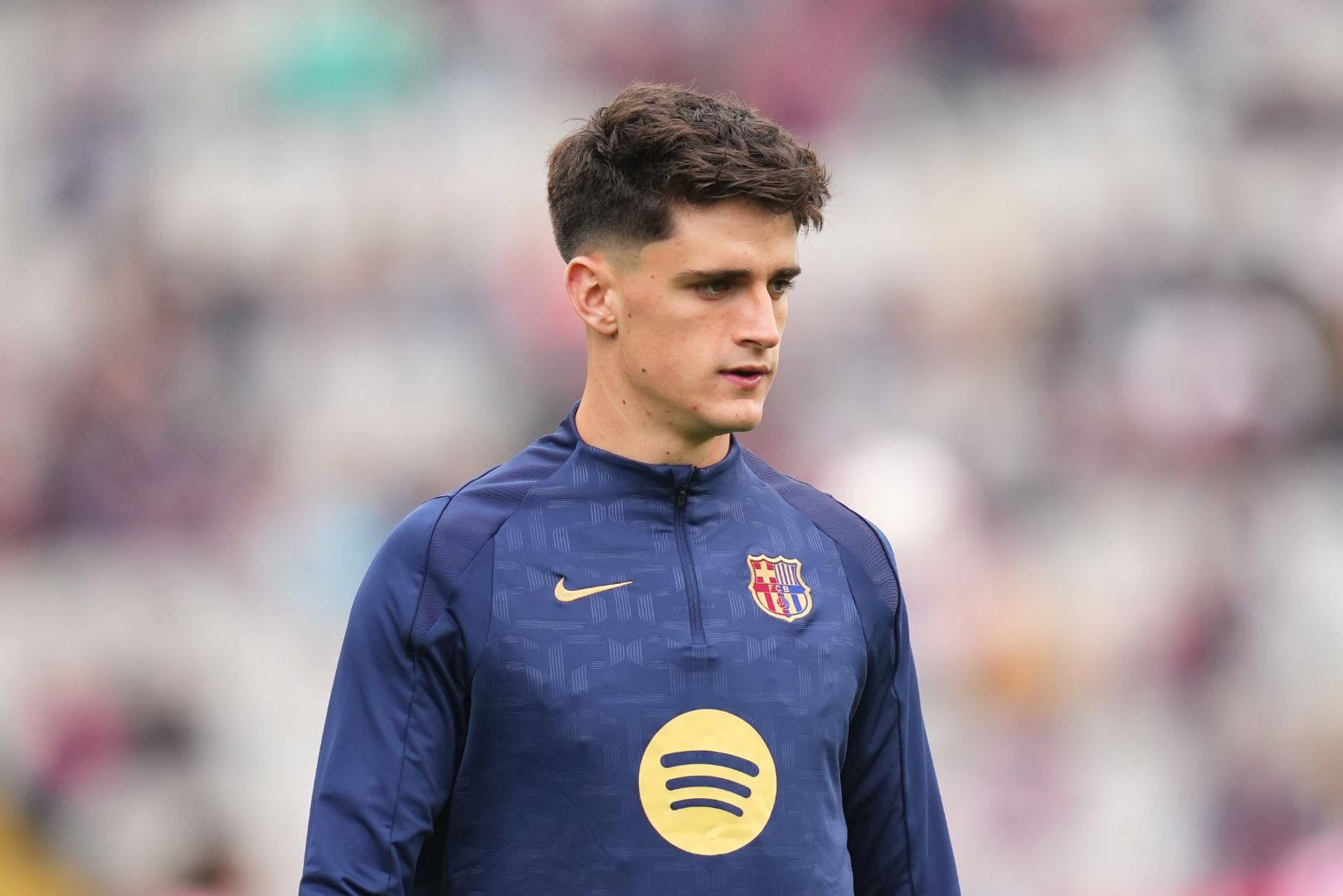 BARCELONA, SPAIN - NOVEMBER 03: Pau Victor of FC Barcelona looks on as he warms up prior to the La Liga EA Sports match between FC Barcelona and RCD Espanyol at Estadi Olimpic Lluis Companys on November 03, 2024 in Barcelona, Spain.