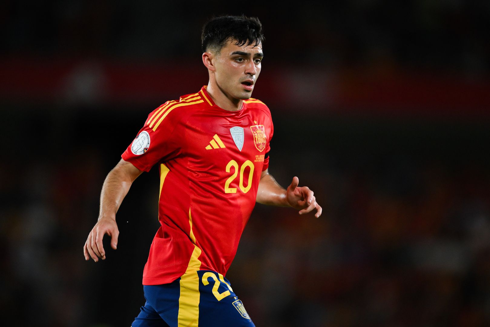 SANTA CRUZ DE TENERIFE, SPAIN - NOVEMBER 18: Pedri of Spain runs with the ball during the UEFA Nations League 2024/25 League A Group A4 match between Spain and Switzerland at El Heliodoro Rodriguez Lopez stadium on November 18, 2024 in Santa Cruz de Tenerife, Spain.