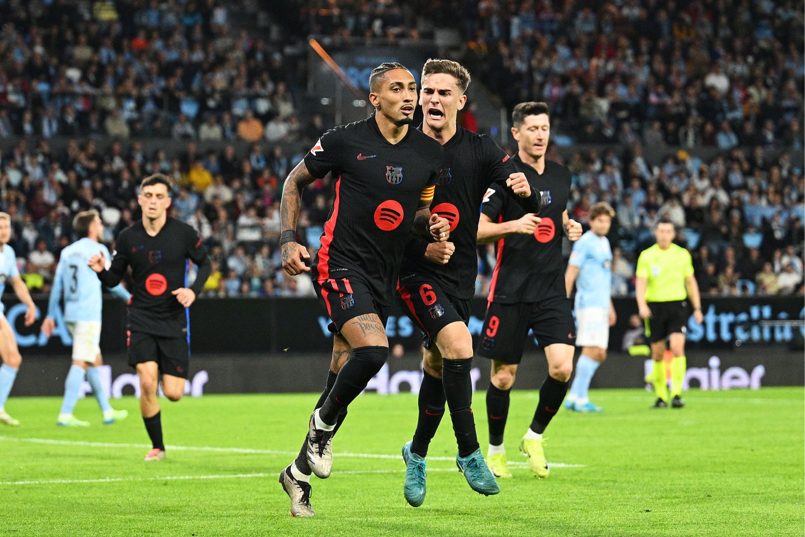 VIGO, SPAIN - NOVEMBER 23: Raphinha of FC Barcelona celebrates scoring his team's first goal during the LaLiga match between RC Celta de Vigo and FC Barcelona at Estadio Balaidos on November 23, 2024 in Vigo, Spain.