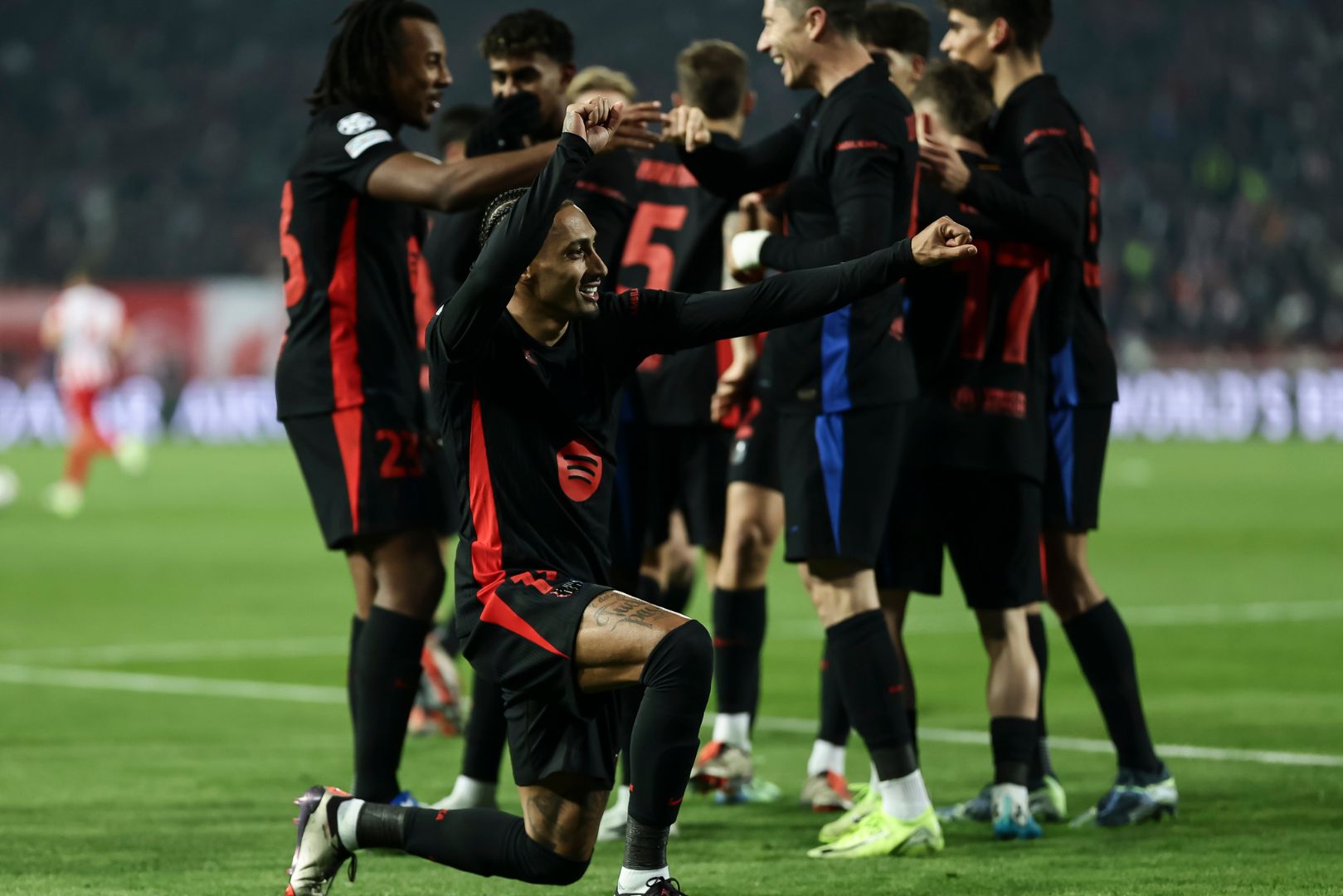 BELGRADE, SERBIA - NOVEMBER 6: Raphinha (L) of Barcelona celebrates after scoring a goal with team mates during the UEFA Champions League 2024/25 League Phase MD4 match between FK Crvena Zvezda and FC Barcelona at Stadium Rajko Mitic on November 6, 2024 in Belgrade, Serbia.