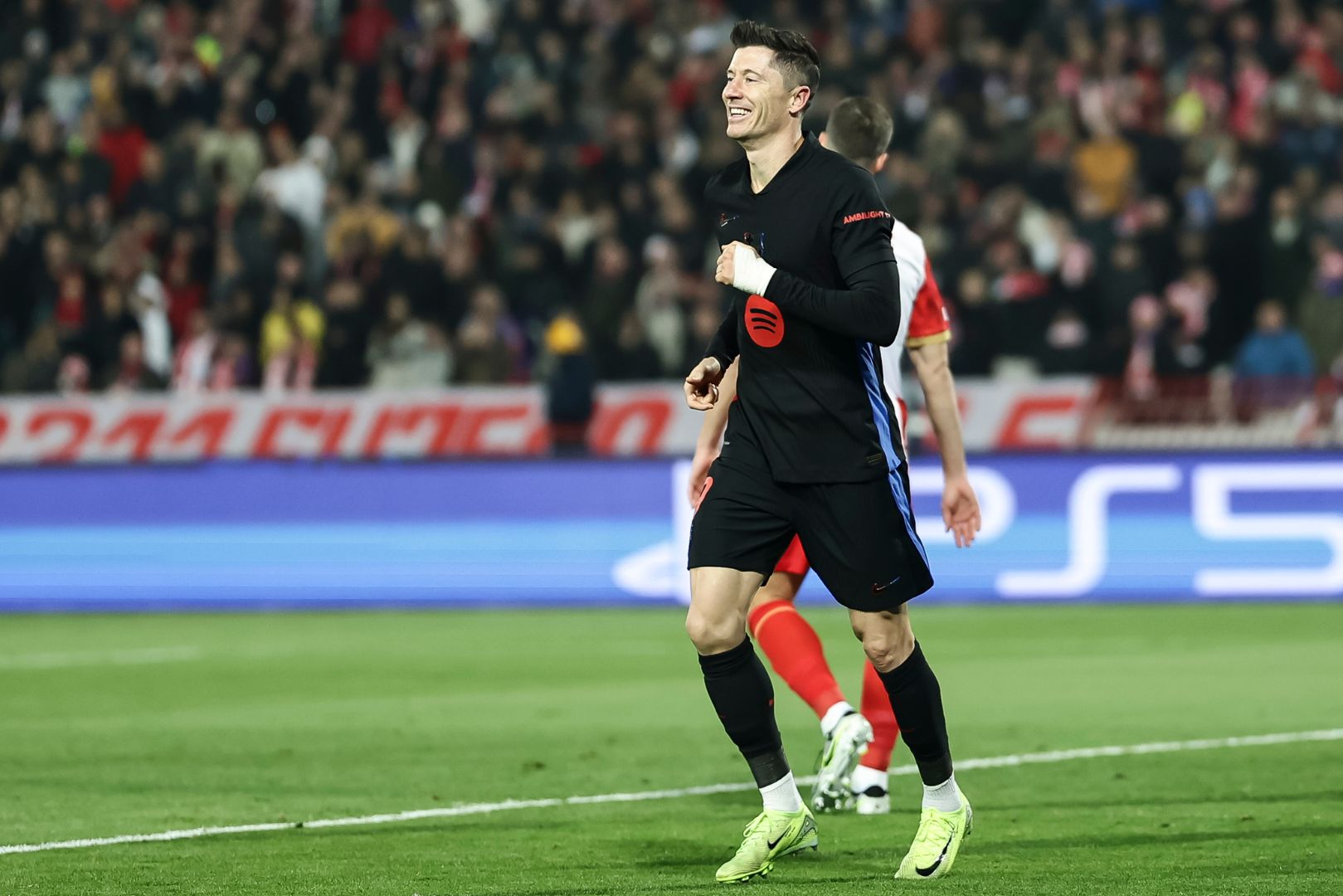 BELGRADE, SERBIA - NOVEMBER 6: Robert Lewandowski (R) of Barcelona celebrates after scoring a goal during the UEFA Champions League 2024/25 League Phase MD4 match between FK Crvena Zvezda and FC Barcelona at Stadium Rajko Mitic on November 6, 2024 in Belgrade, Serbia.