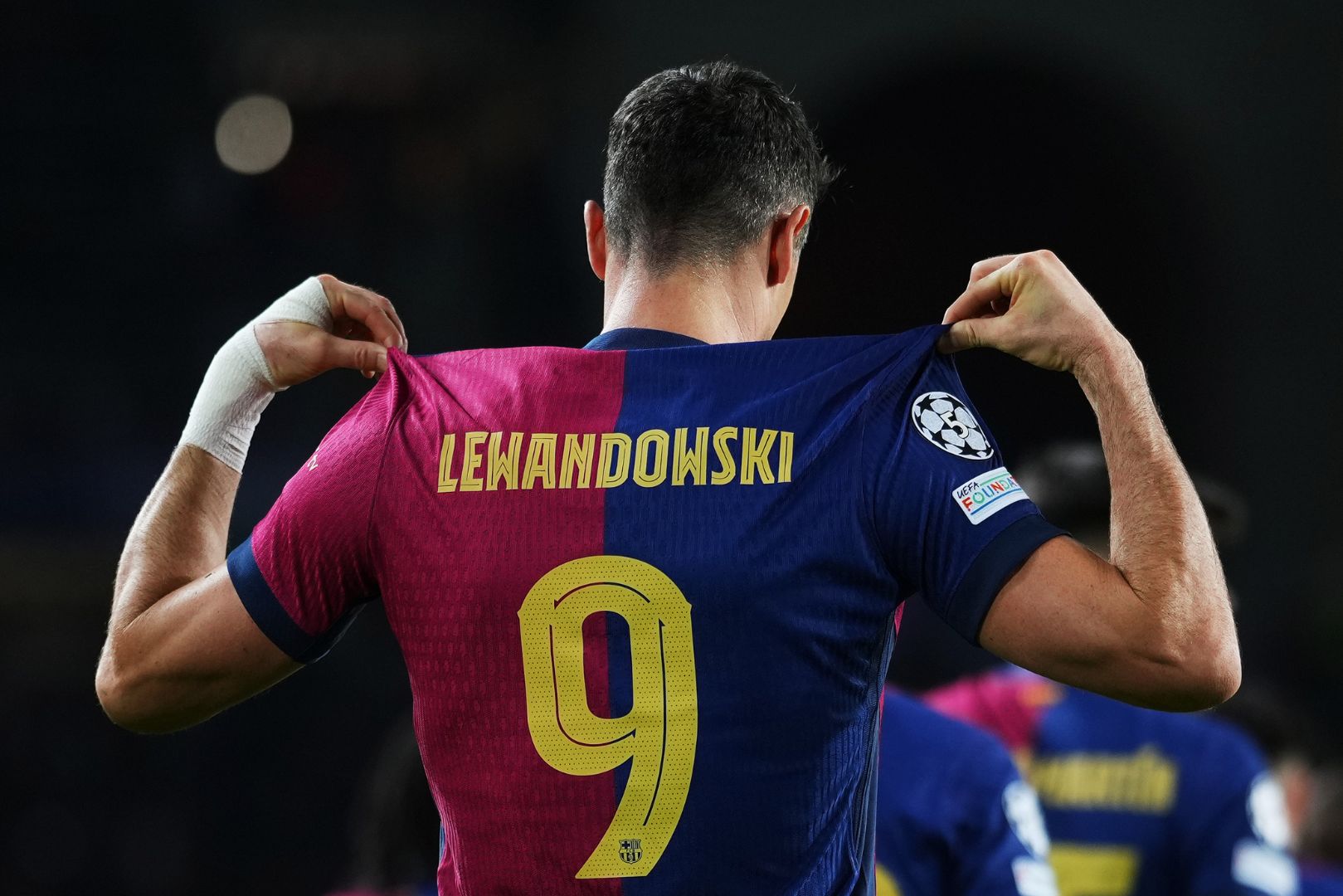 BARCELONA, SPAIN - NOVEMBER 26: Robert Lewandowski of FC Barcelona celebrates scoring his team's first goal from a penalty during the UEFA Champions League 2024/25 League Phase MD5 match between FC Barcelona and Stade Brestois 29 at Estadi Olimpic Lluis Companys on November 26, 2024 in Barcelona, Spain.